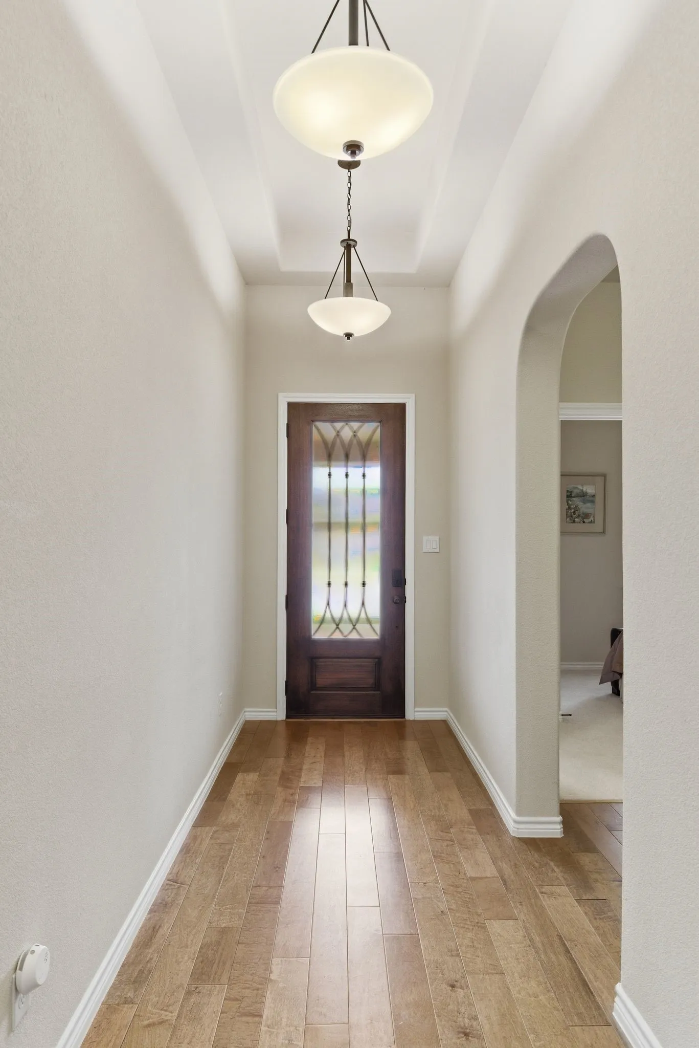 Elegant entry way greets your guests.