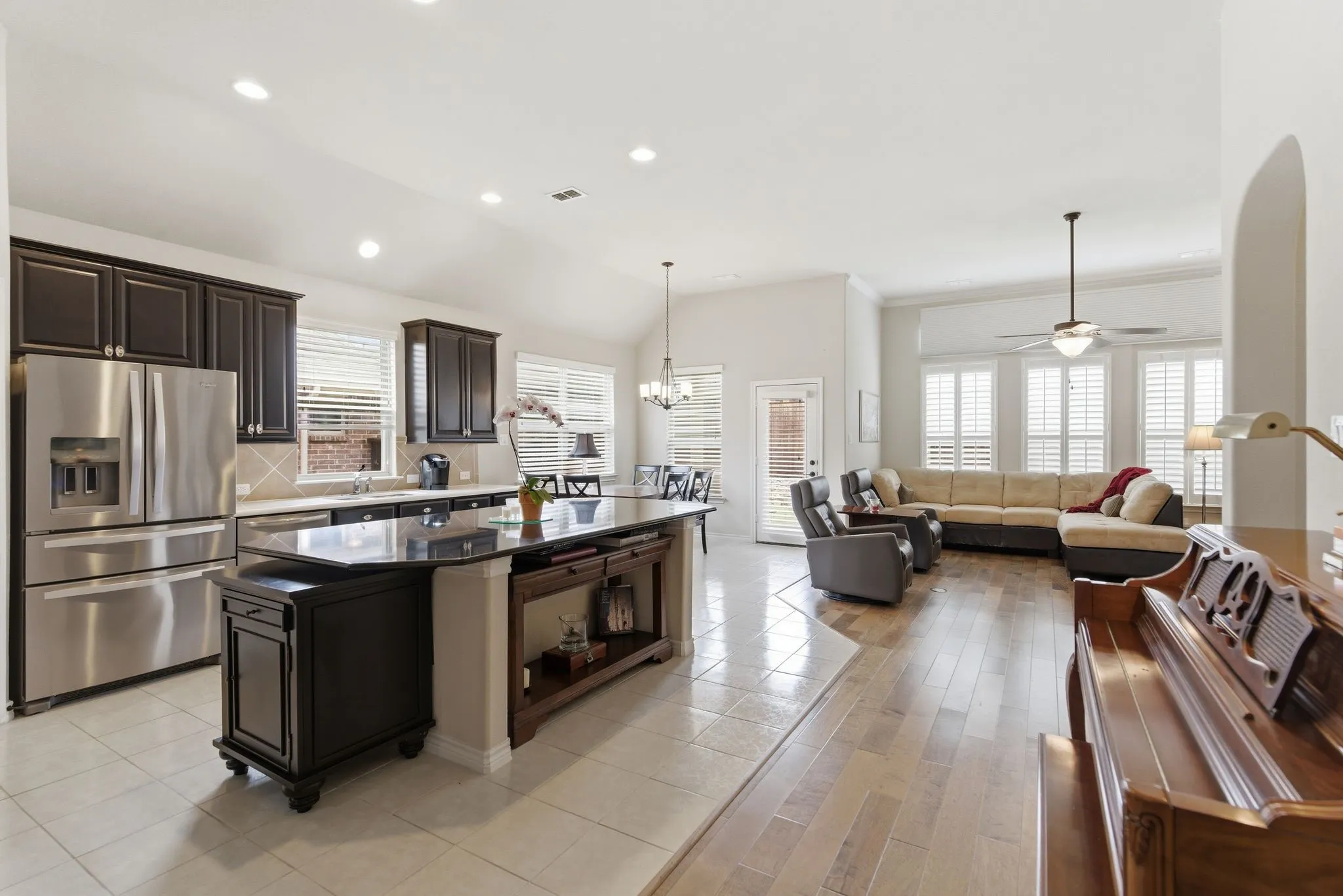 The kitchen is open to the breakfast room and family room.