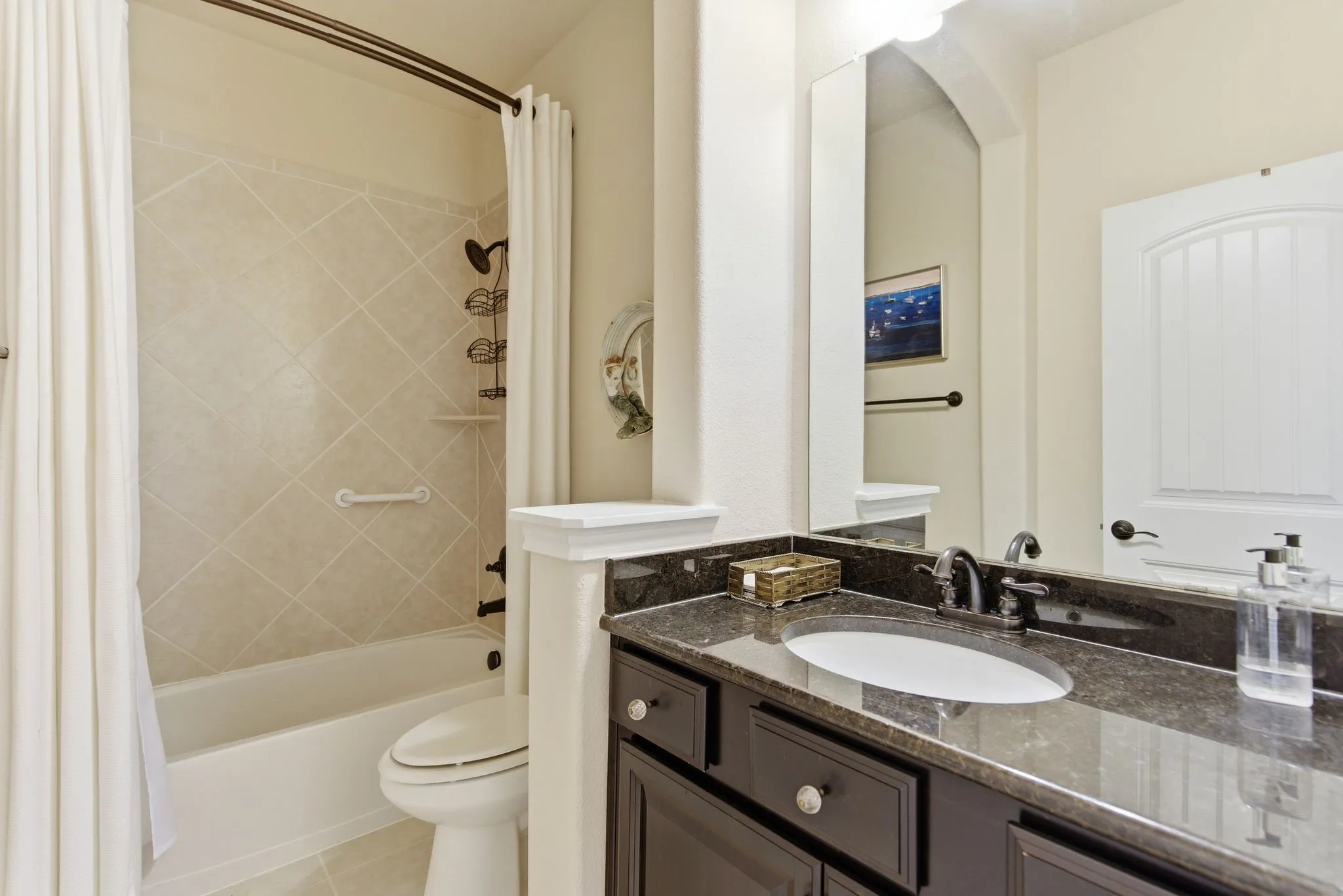 Custom finishes in the hall bath.