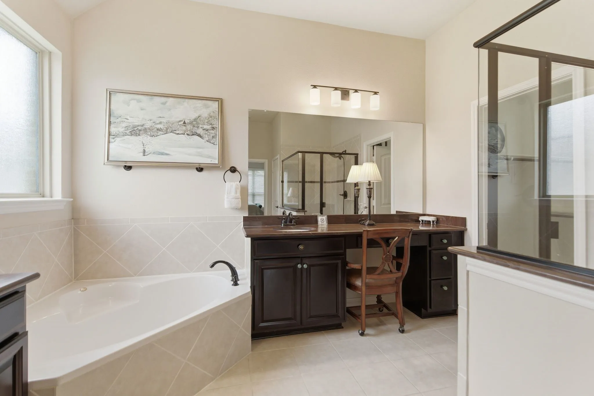 Separate vanities, garden tub and walk in shower-primary bath