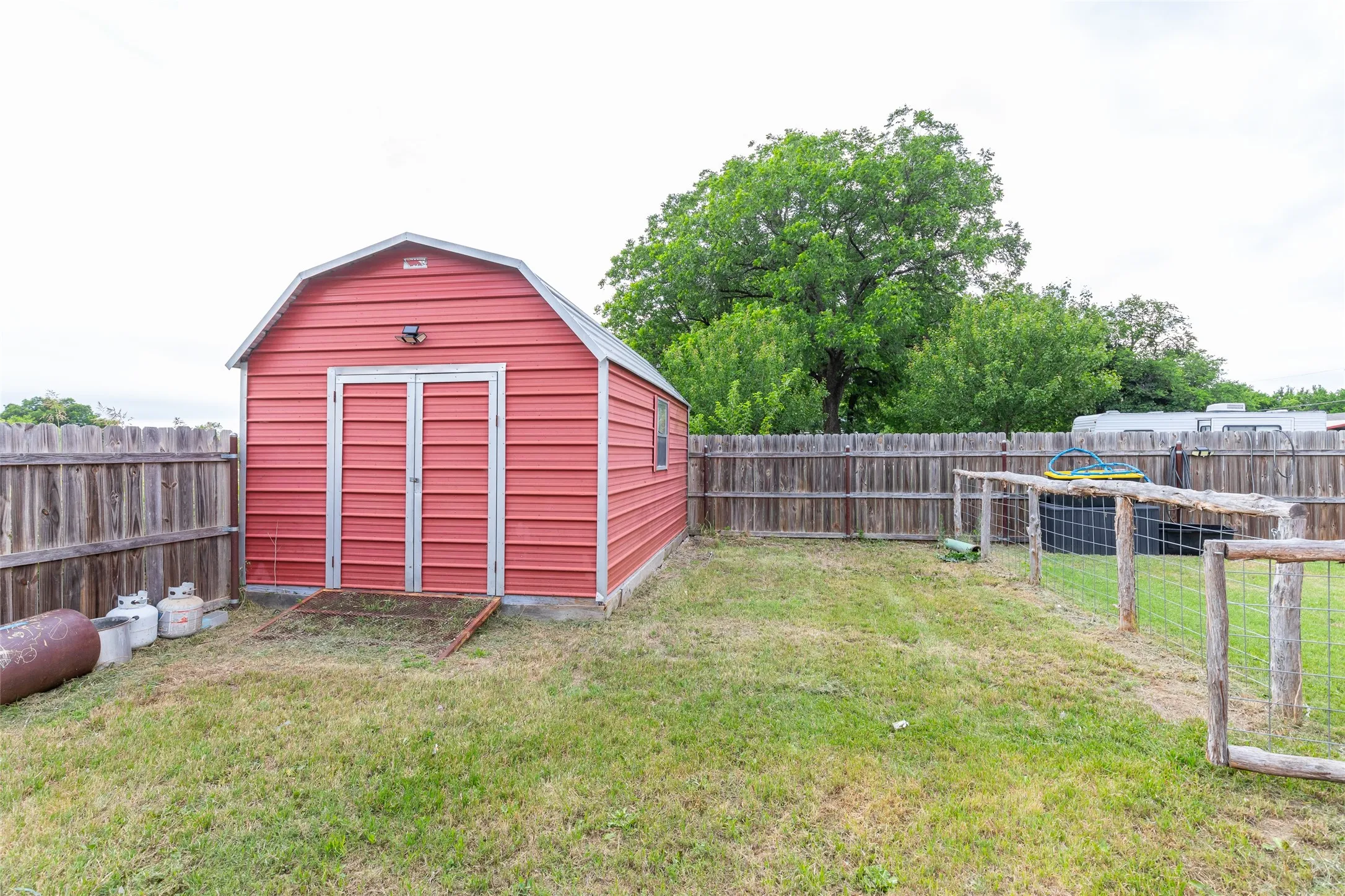 Storage building on side yard