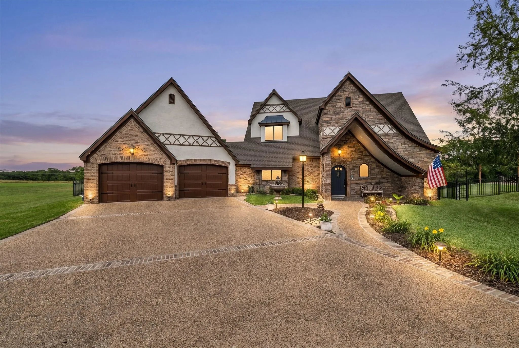 Stone and stucco exterior with dark wood trim accents