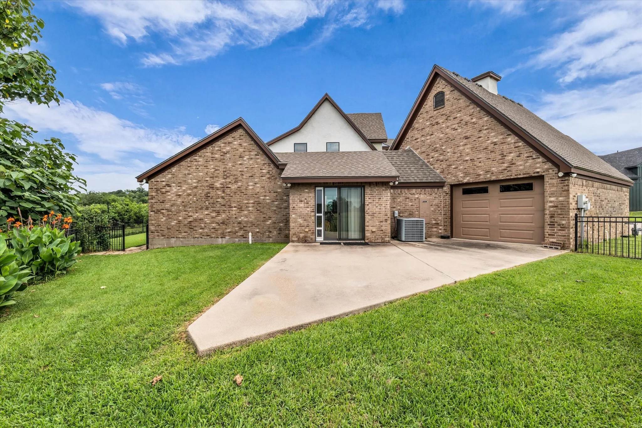 Expansive brick exterior with a pitched roofline