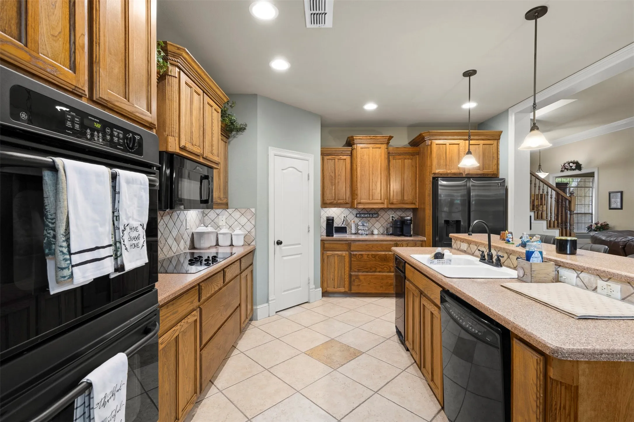 Pantry.  Double ovens.  Lots of cabinets and counter space.