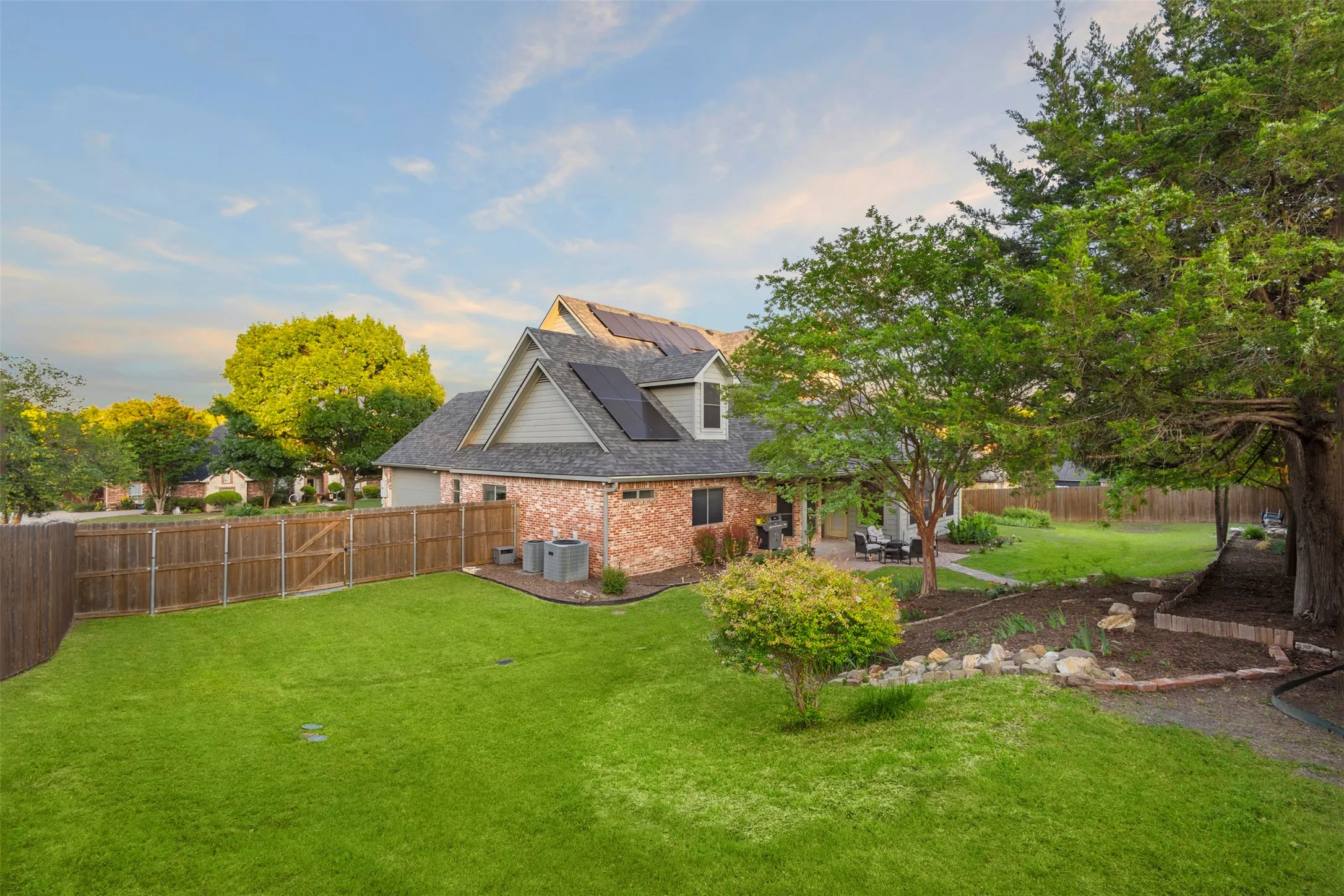 Enjoy this beautiful landscaped yard.