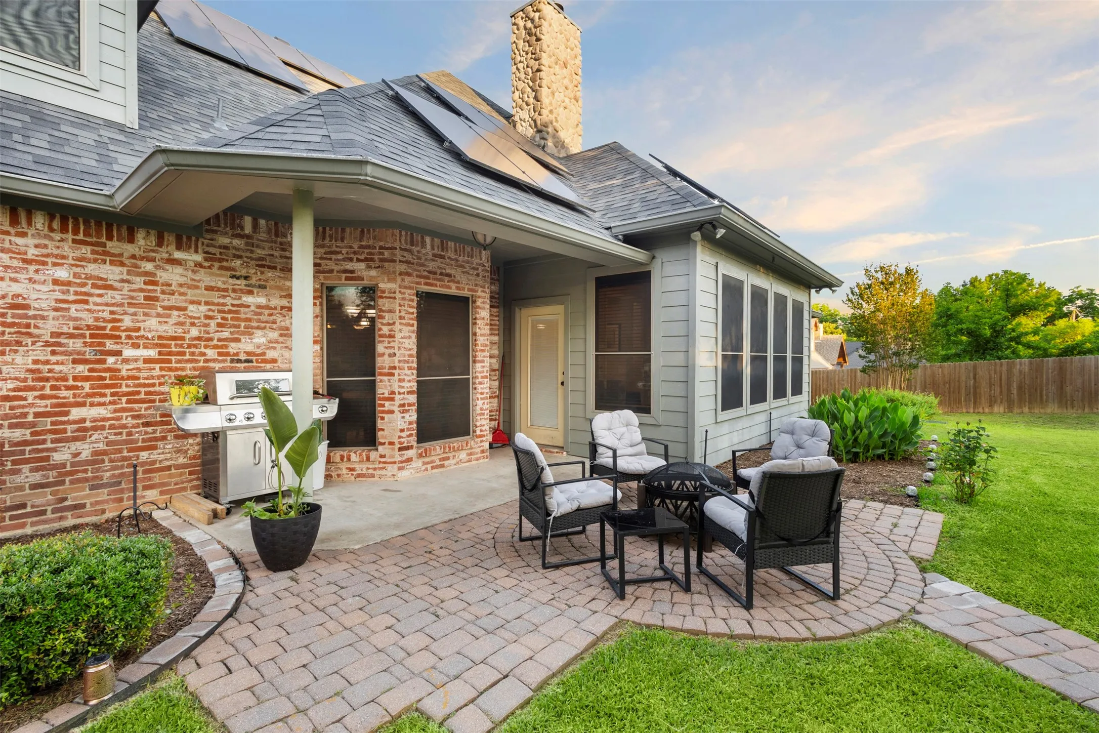 Enjoy one of two back yard patios in this landscaped yard.
