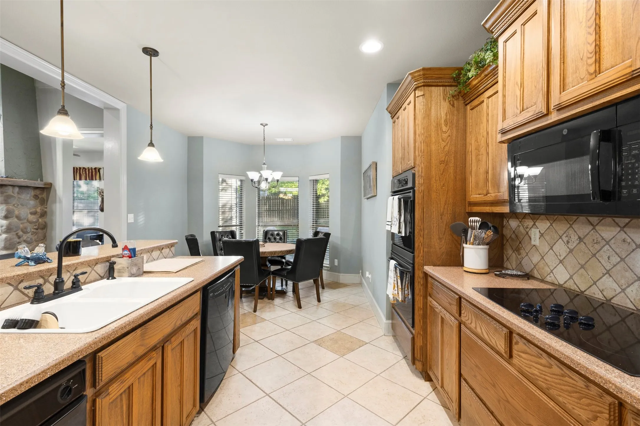 Breakfast area adjoins the kitchen.  Great space for a family game night.