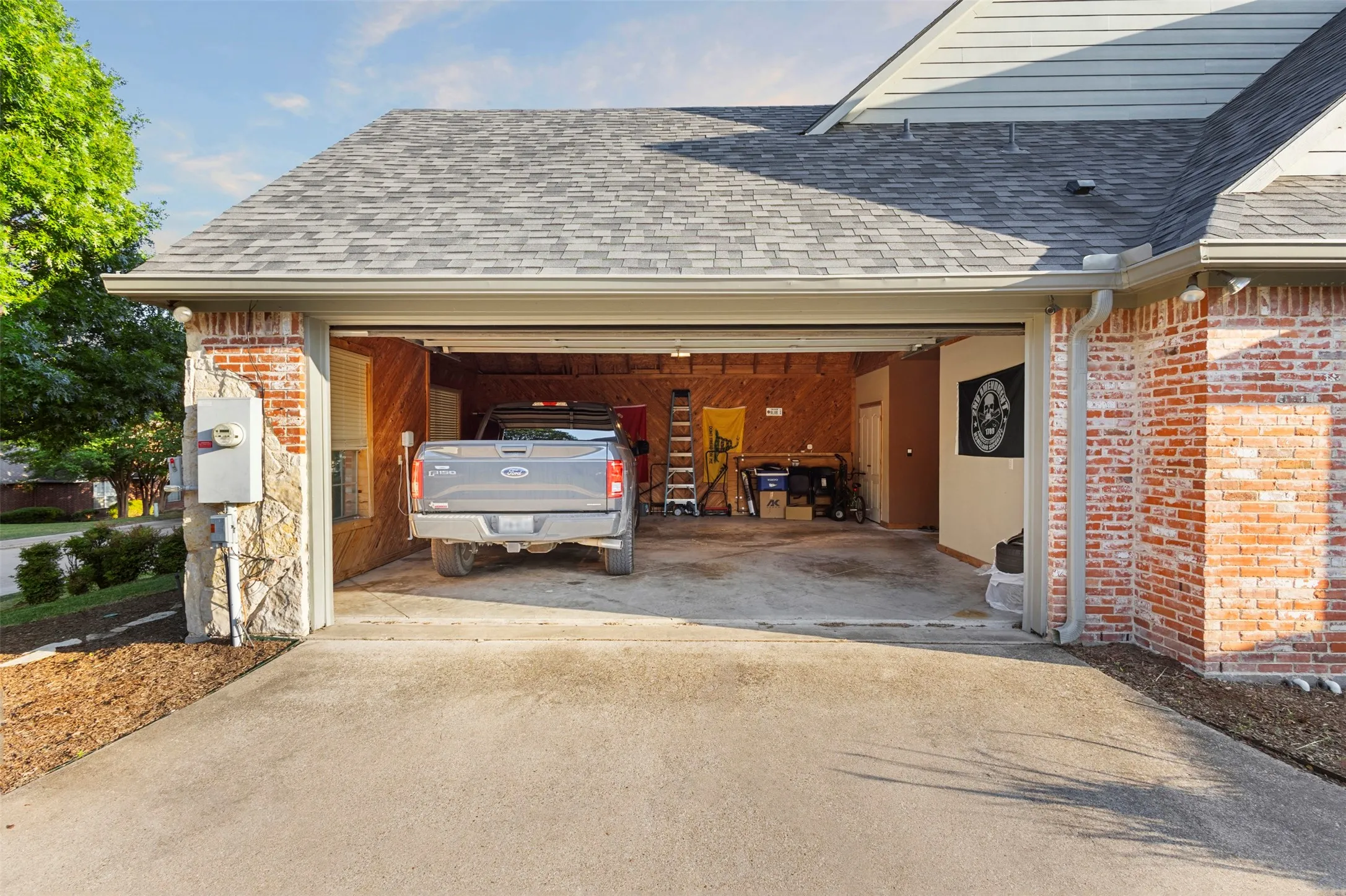 Two car garage.  Did you notice the walls are NOT sheetrock??