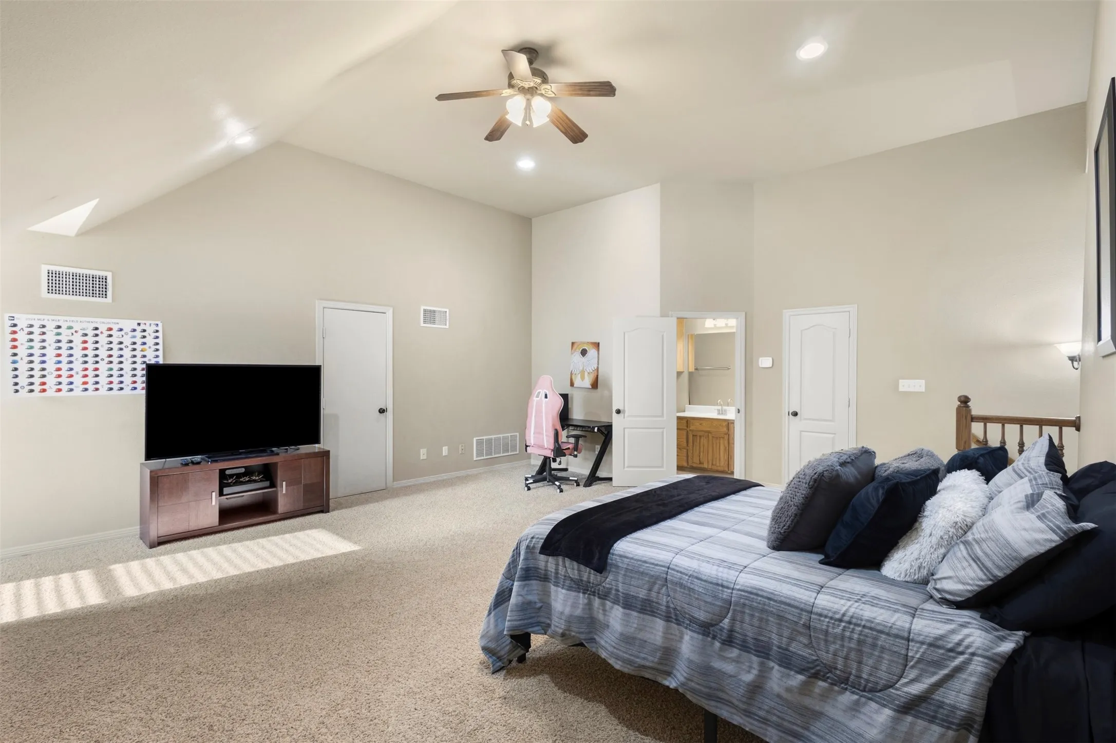 Upstairs bedroom is a great flexible space with a full bath and closet.
