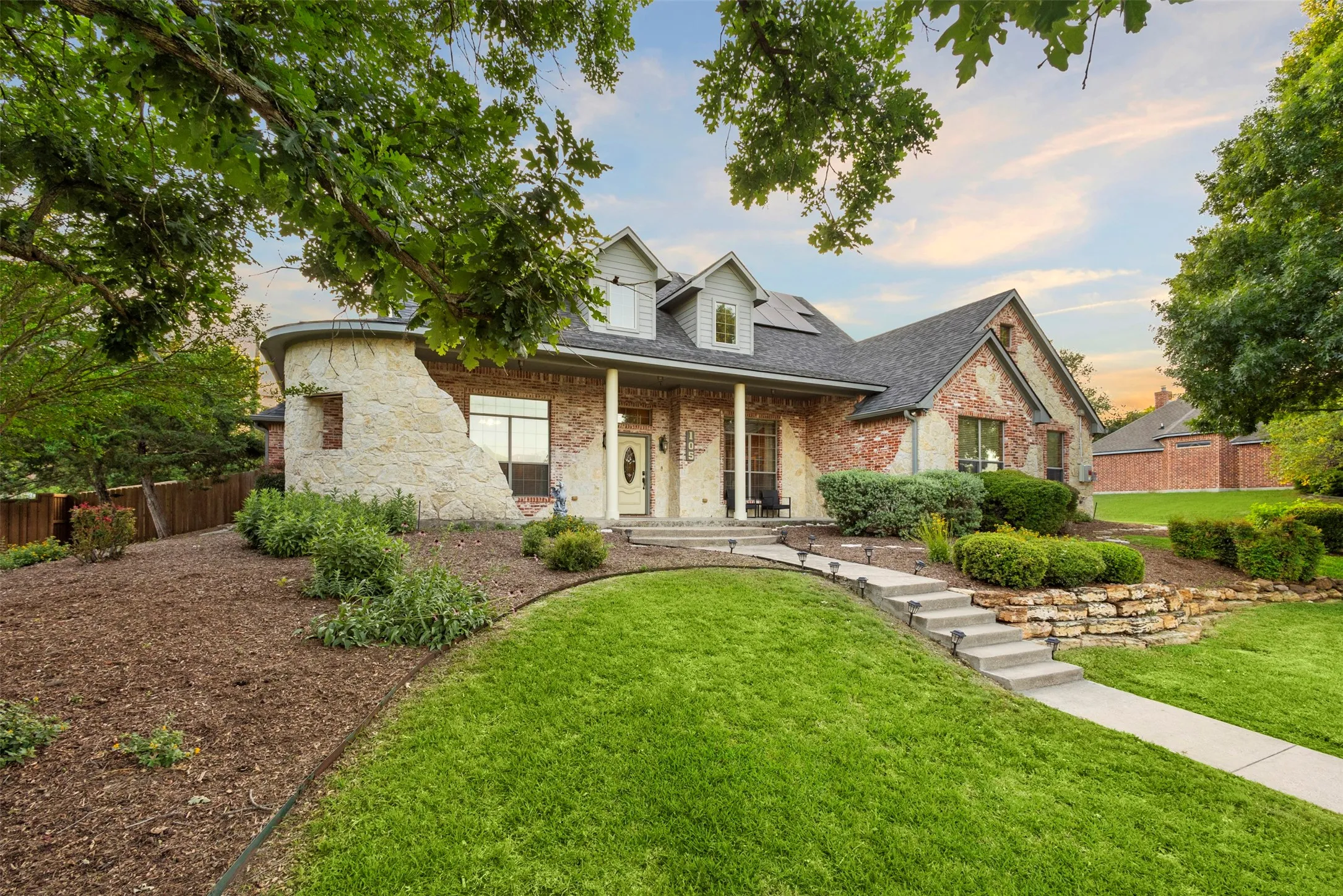 105 Country Ridge Ct with a beautifully unique landscaped front yard