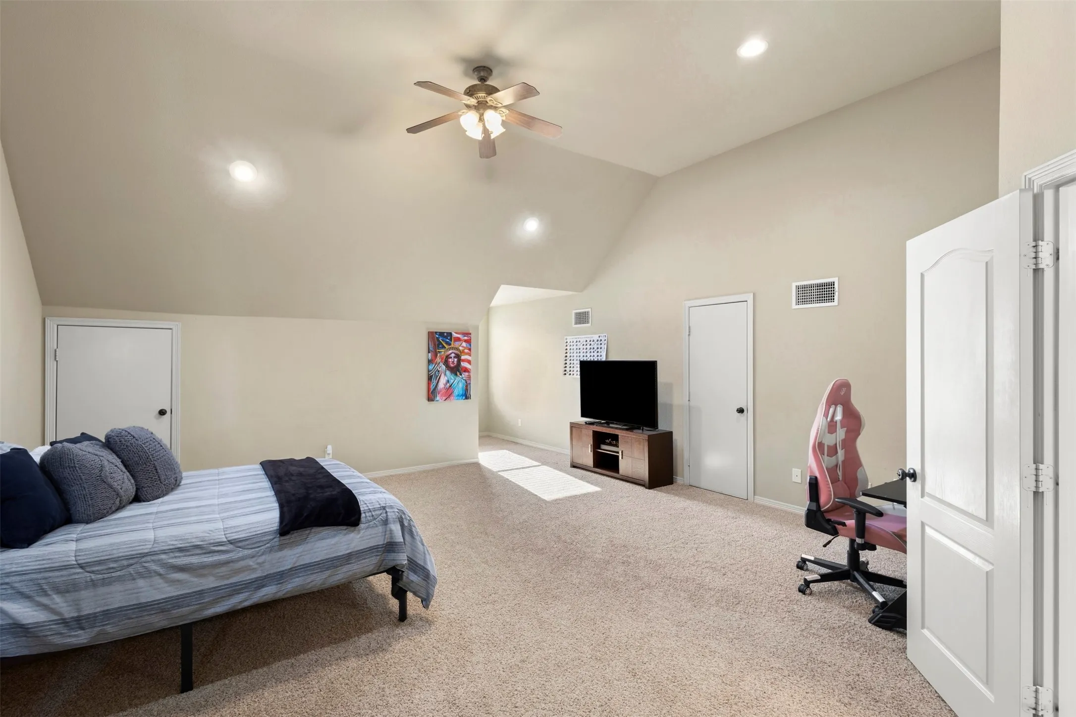 Upstairs space that is flexibale enough to be a bedroom, a media room, work out space or home schooling area.  It has a full en suite bath and closet.