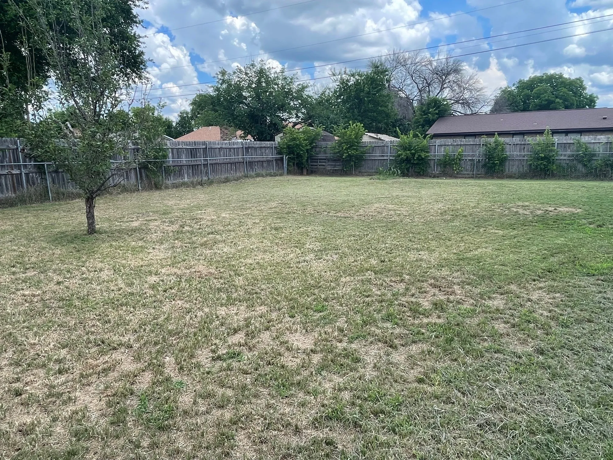Featuring backyard and fencing.