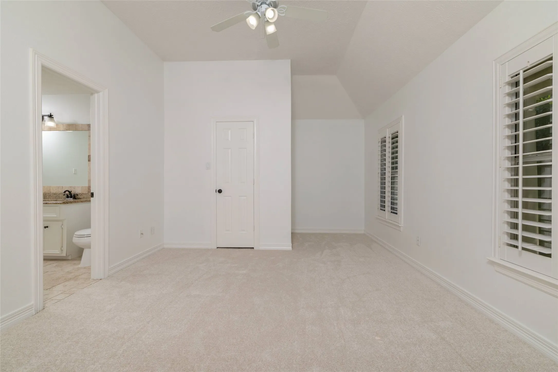 Split upstairs bedroom with a continental bath is ideal as a guest suite.