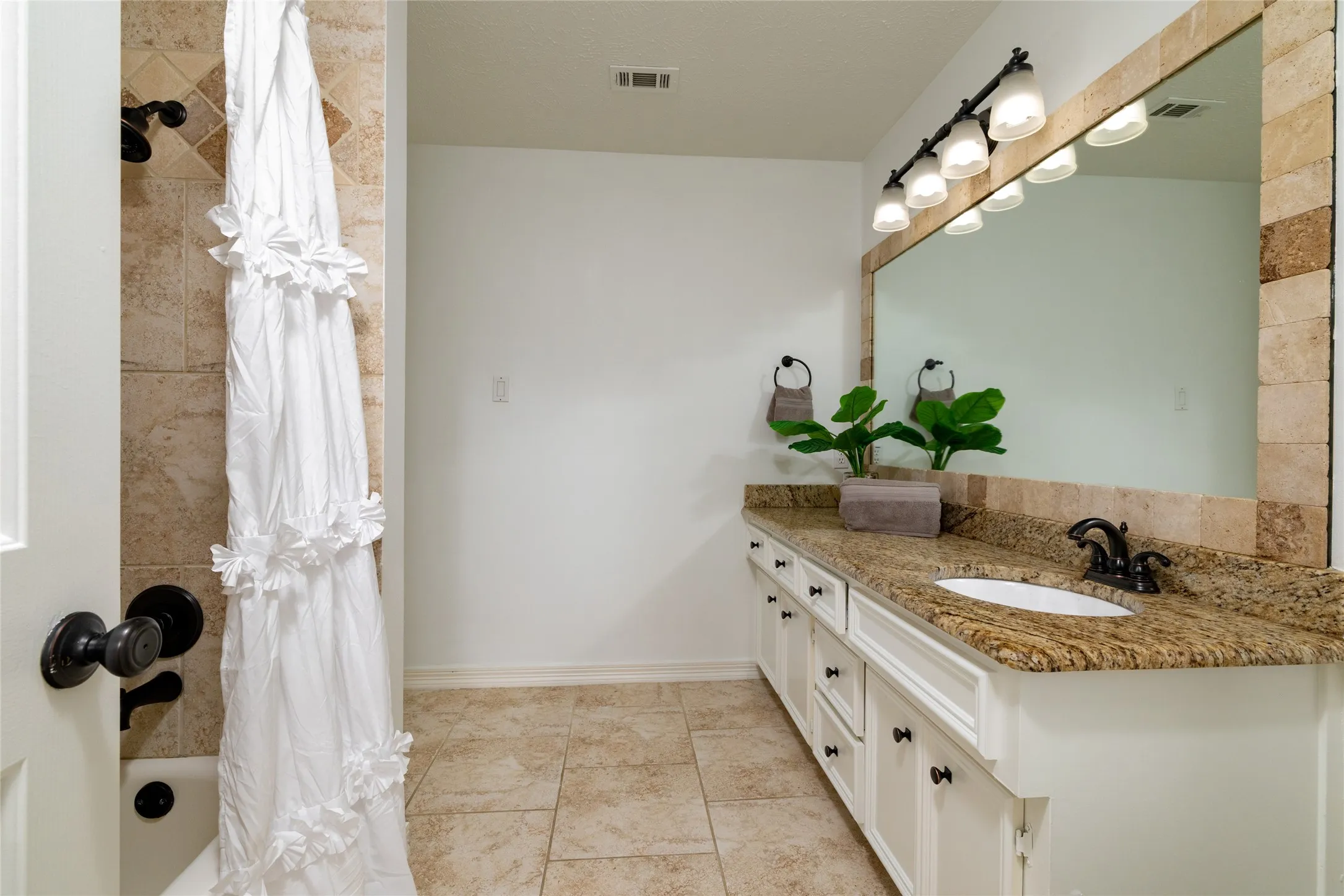 Updated granite and ceramic tile.