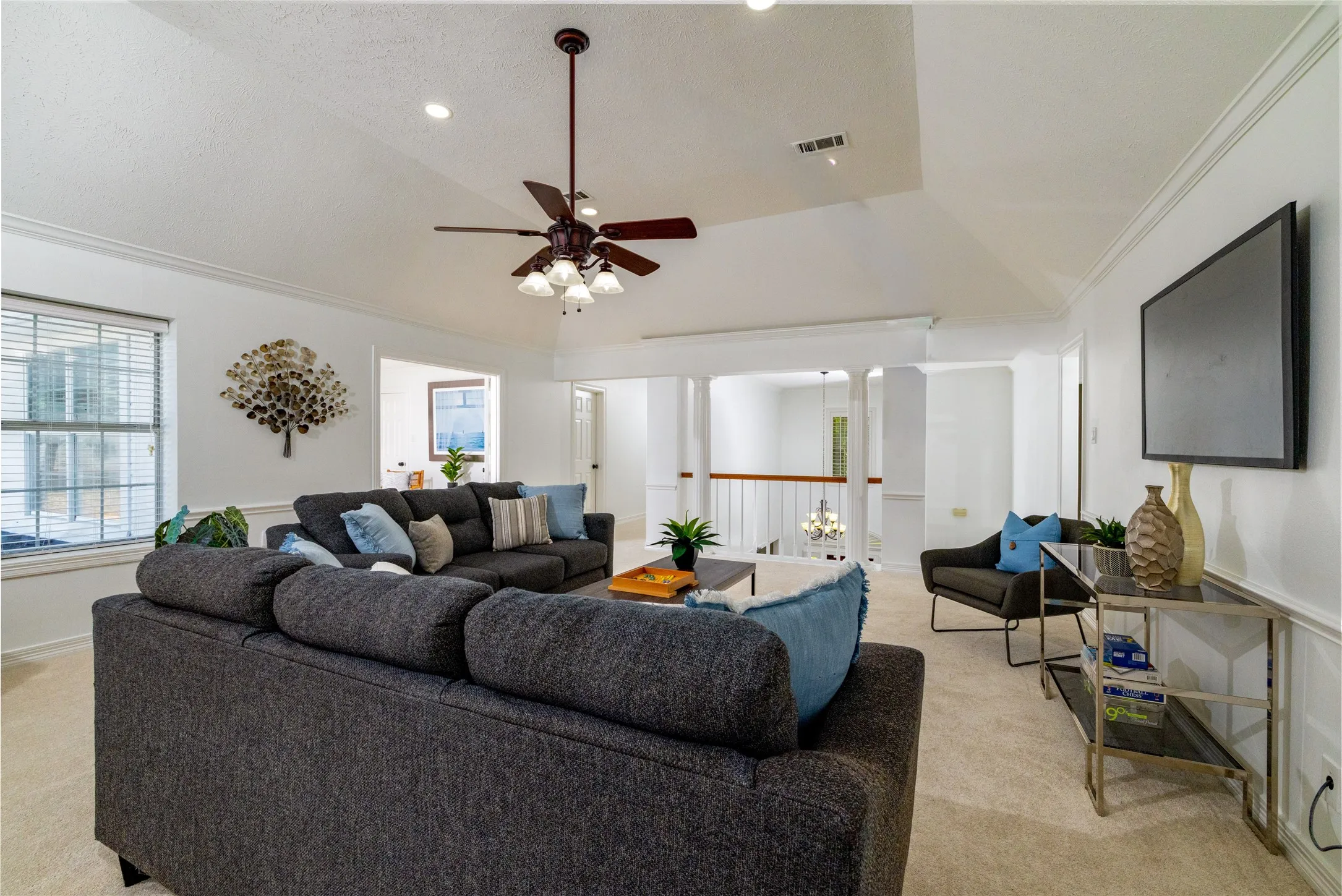 The gameroom overlooks the entry. To the left is the 5th bedroom or upstairs study.