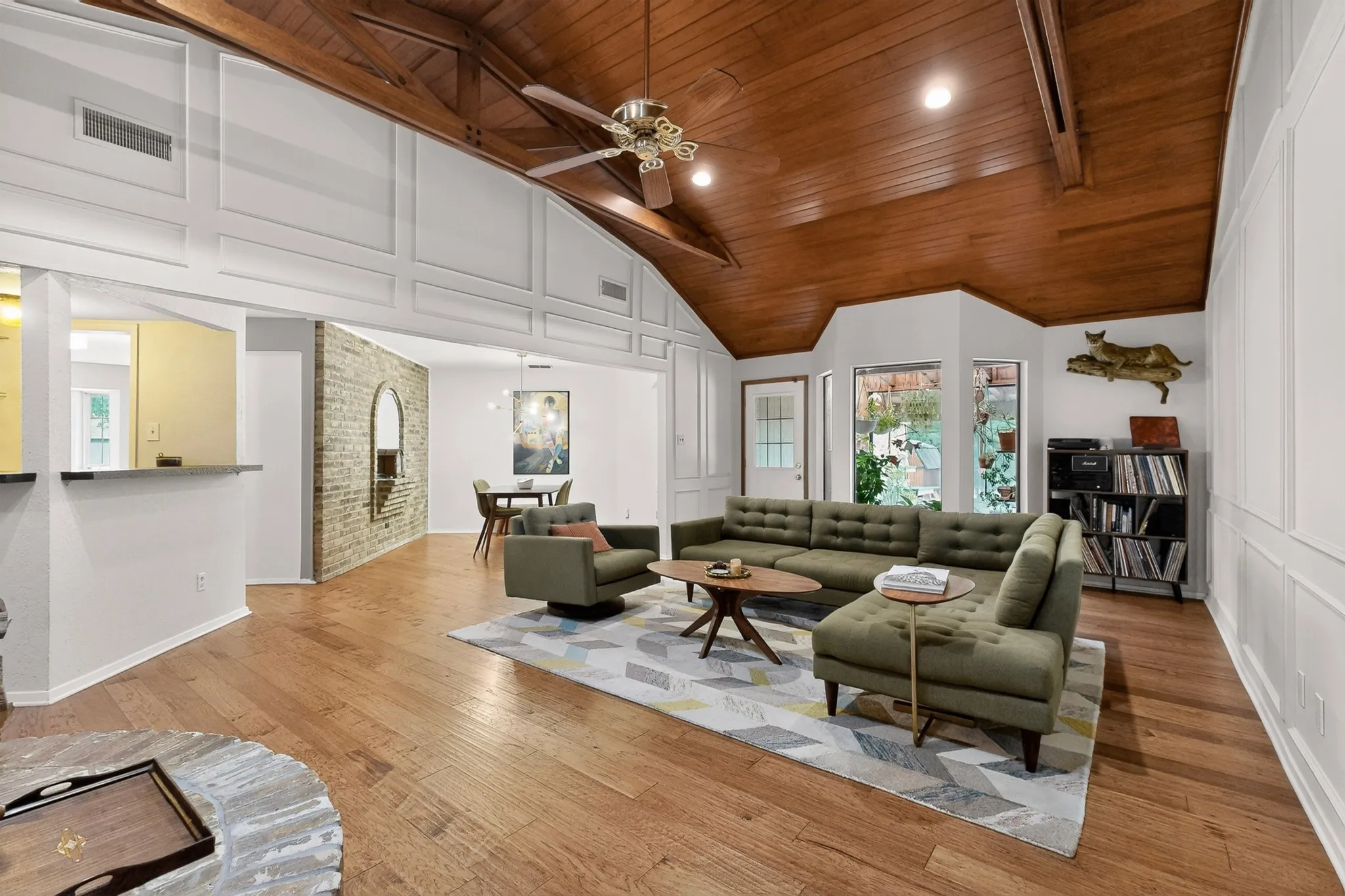 Vaulted wood-paneled ceiling with exposed beams