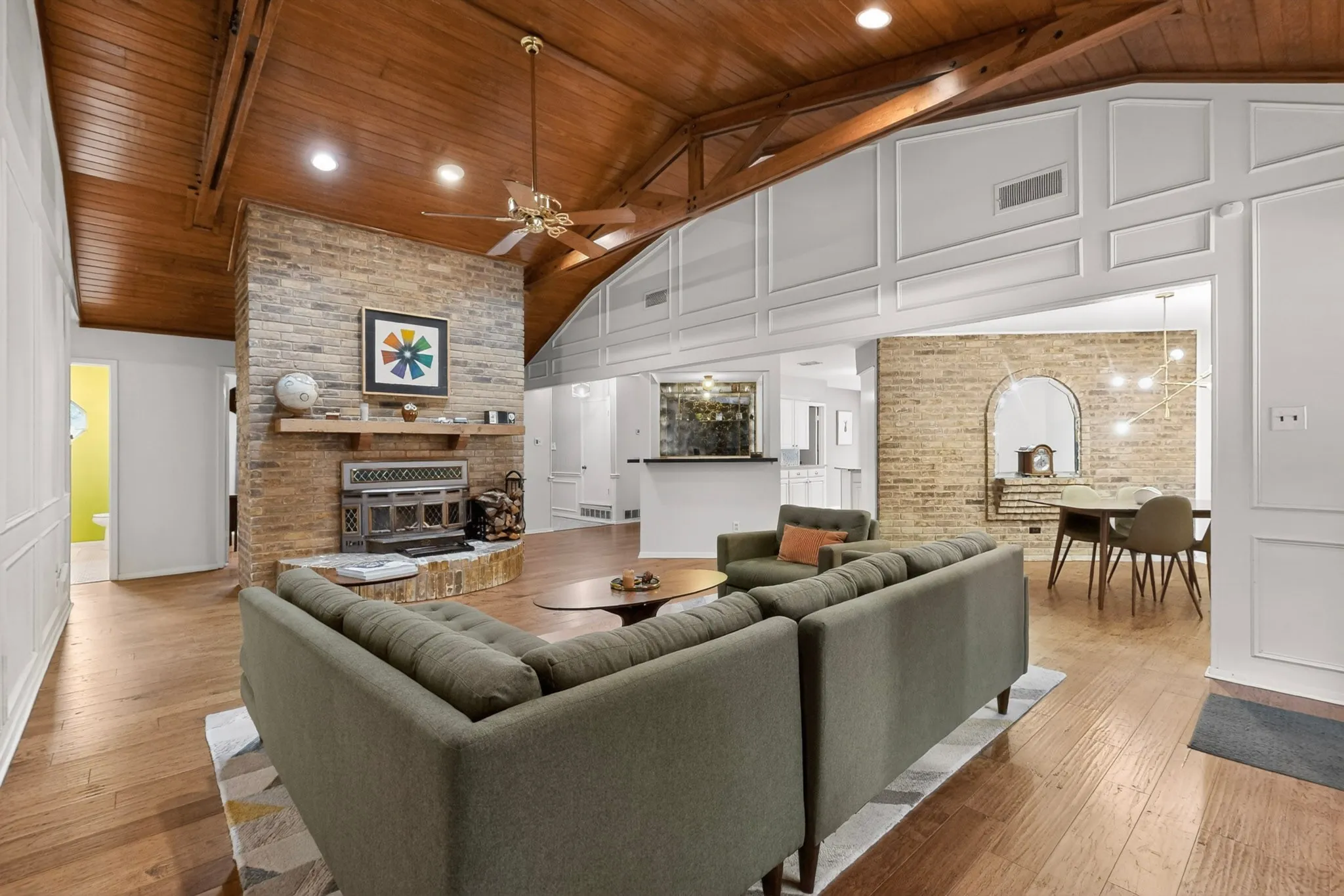 Vaulted wood-paneled ceiling with exposed beams
