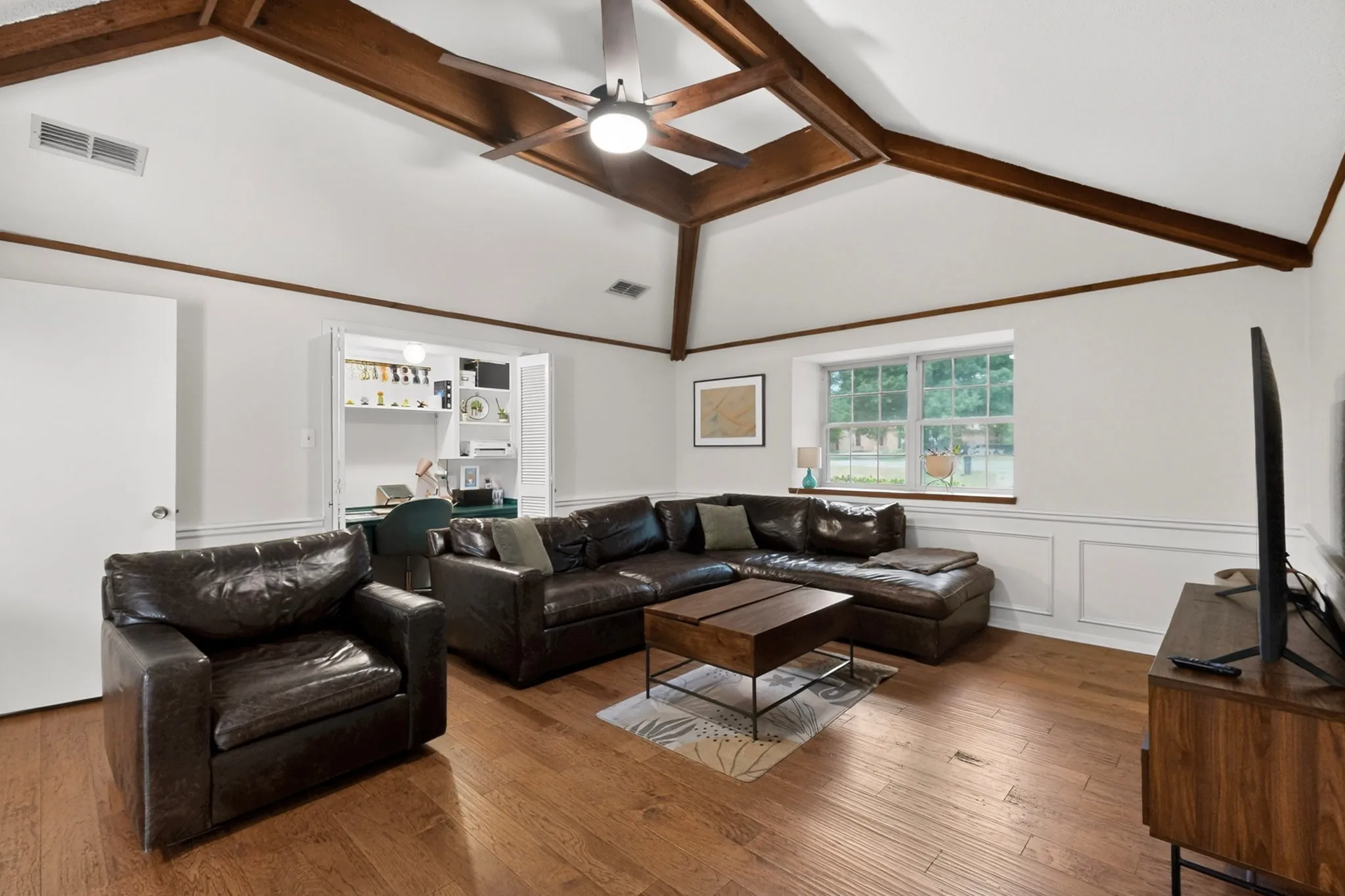 Vaulted ceiling with exposed wood beams