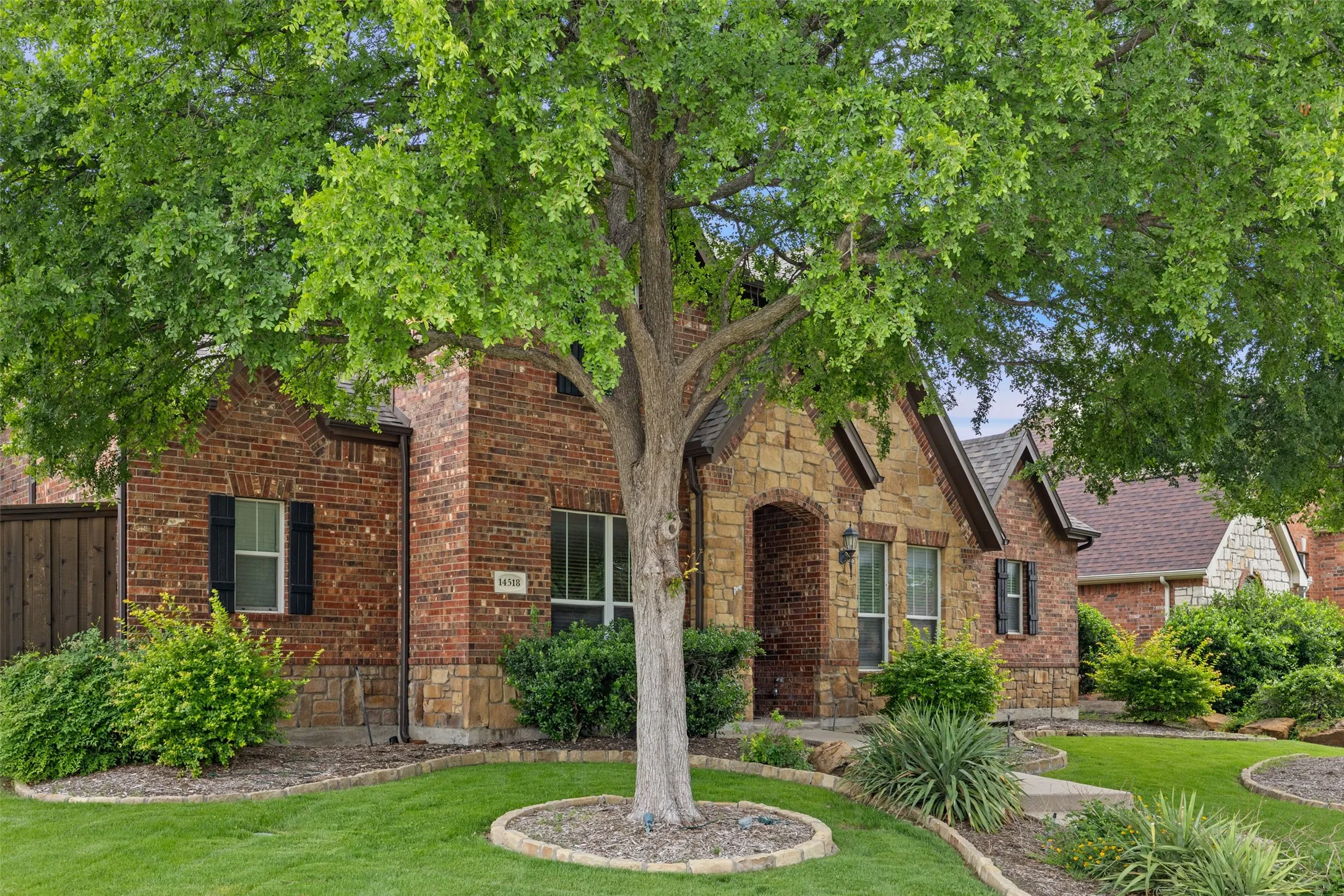 Tudor house with a front yard