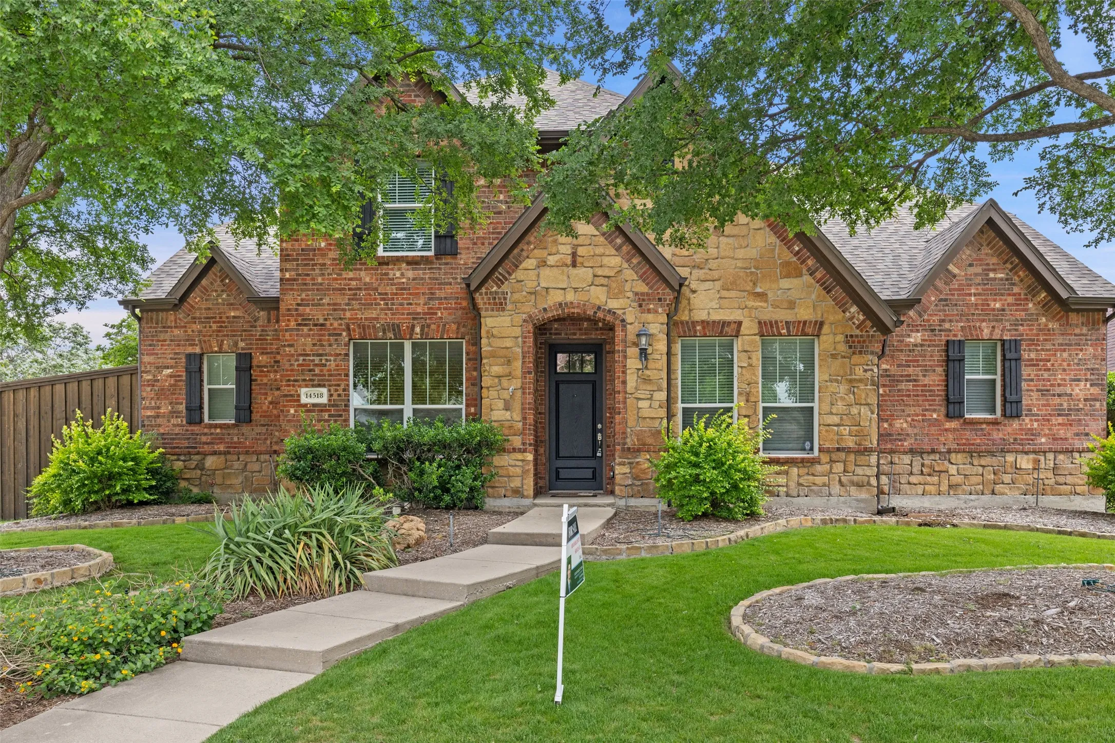 Tudor home featuring a front yard
