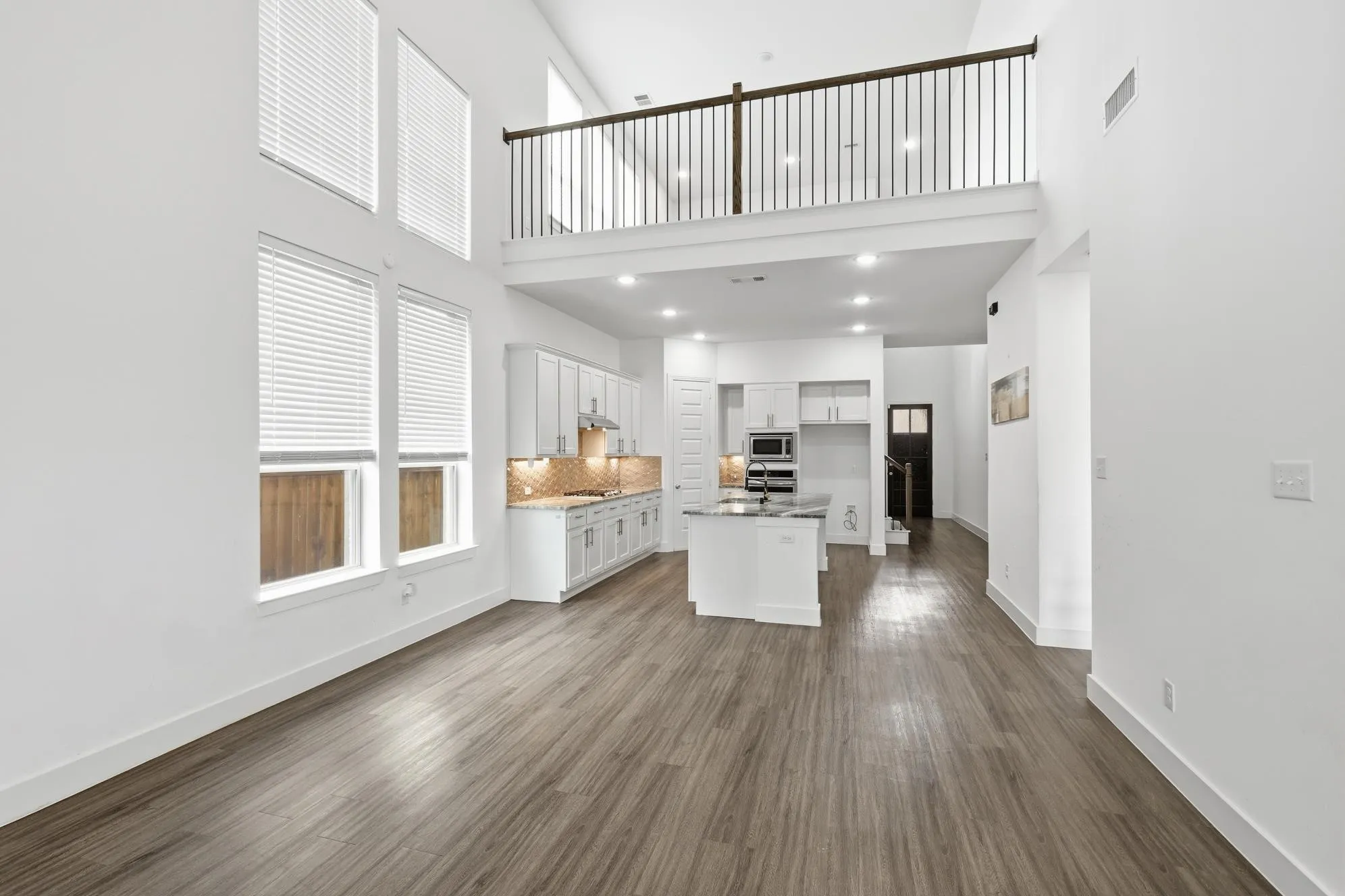 Living space open to kitchen and you can see the fun Loft, Game room space upstairs