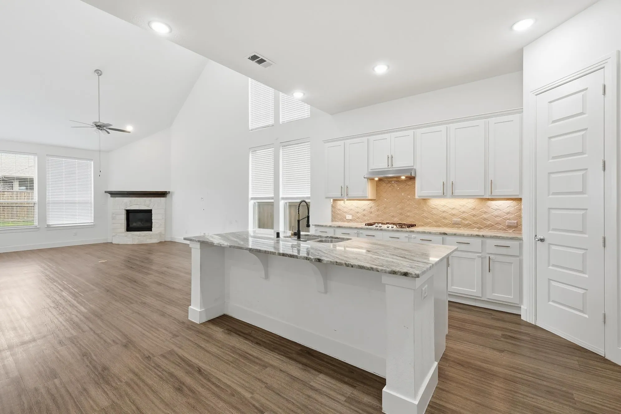 Oversized island with additional room for seating, prepping food, and gathering