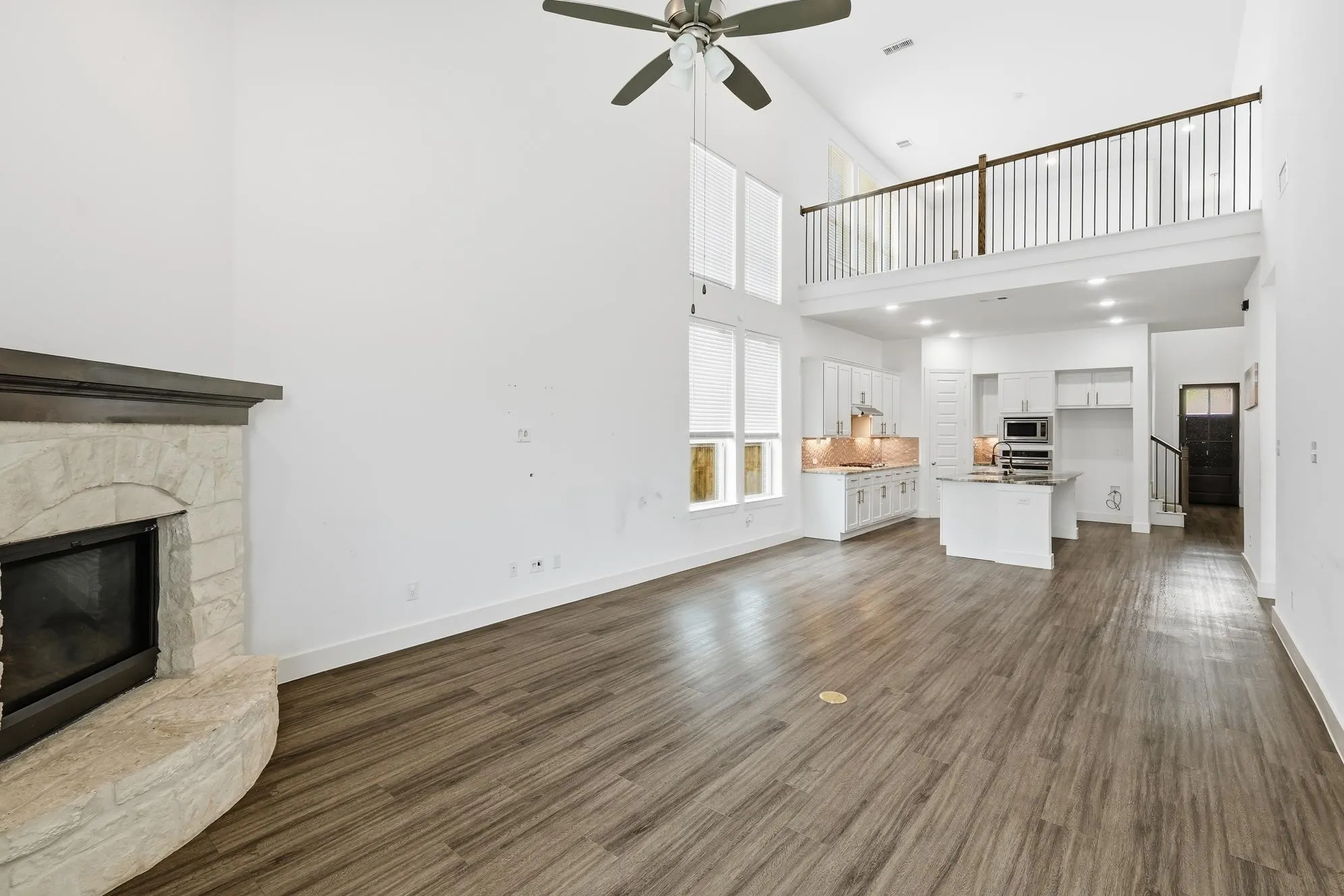 Other view of living space open to kitchen