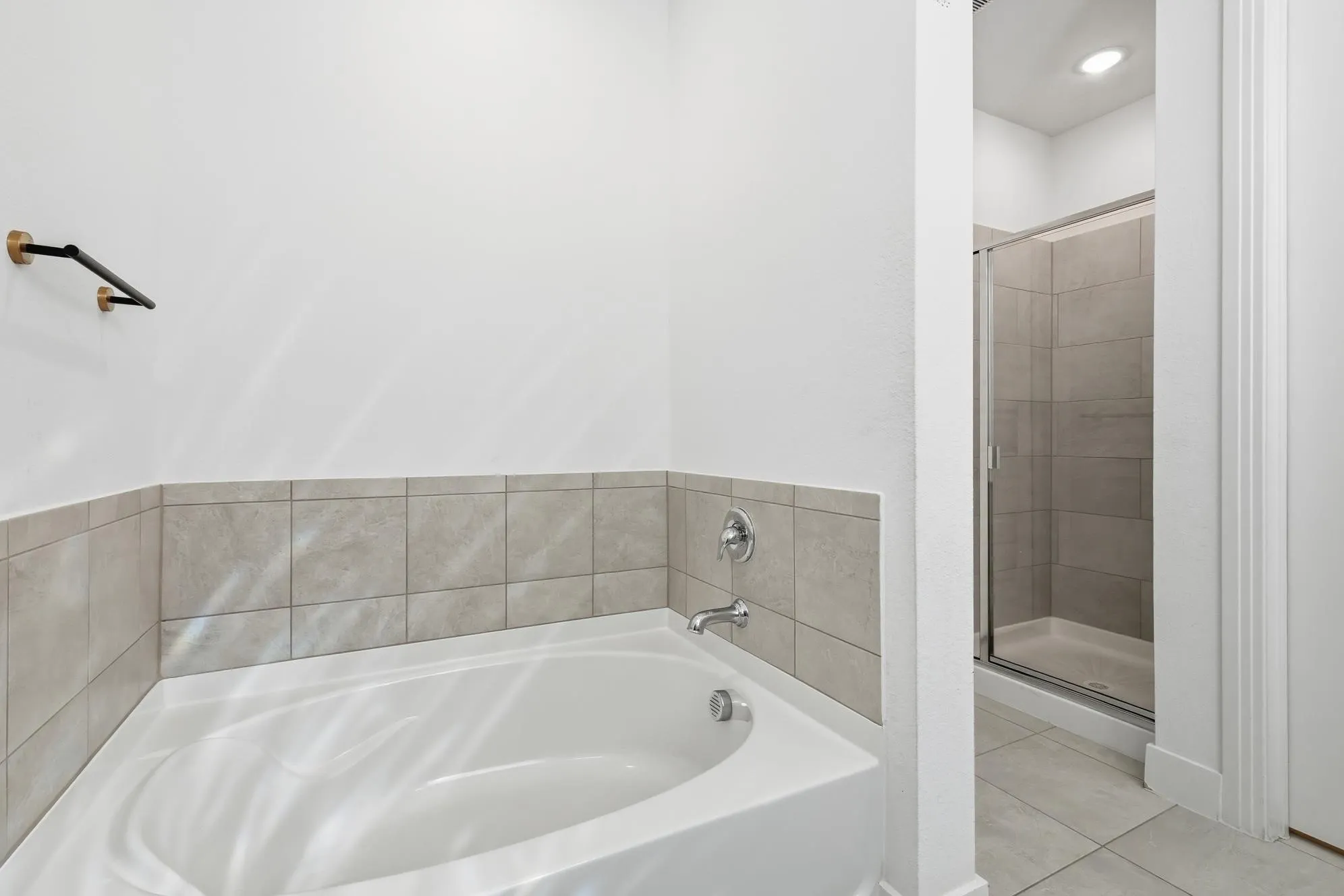 Garden tub and seperate shower in the primary room