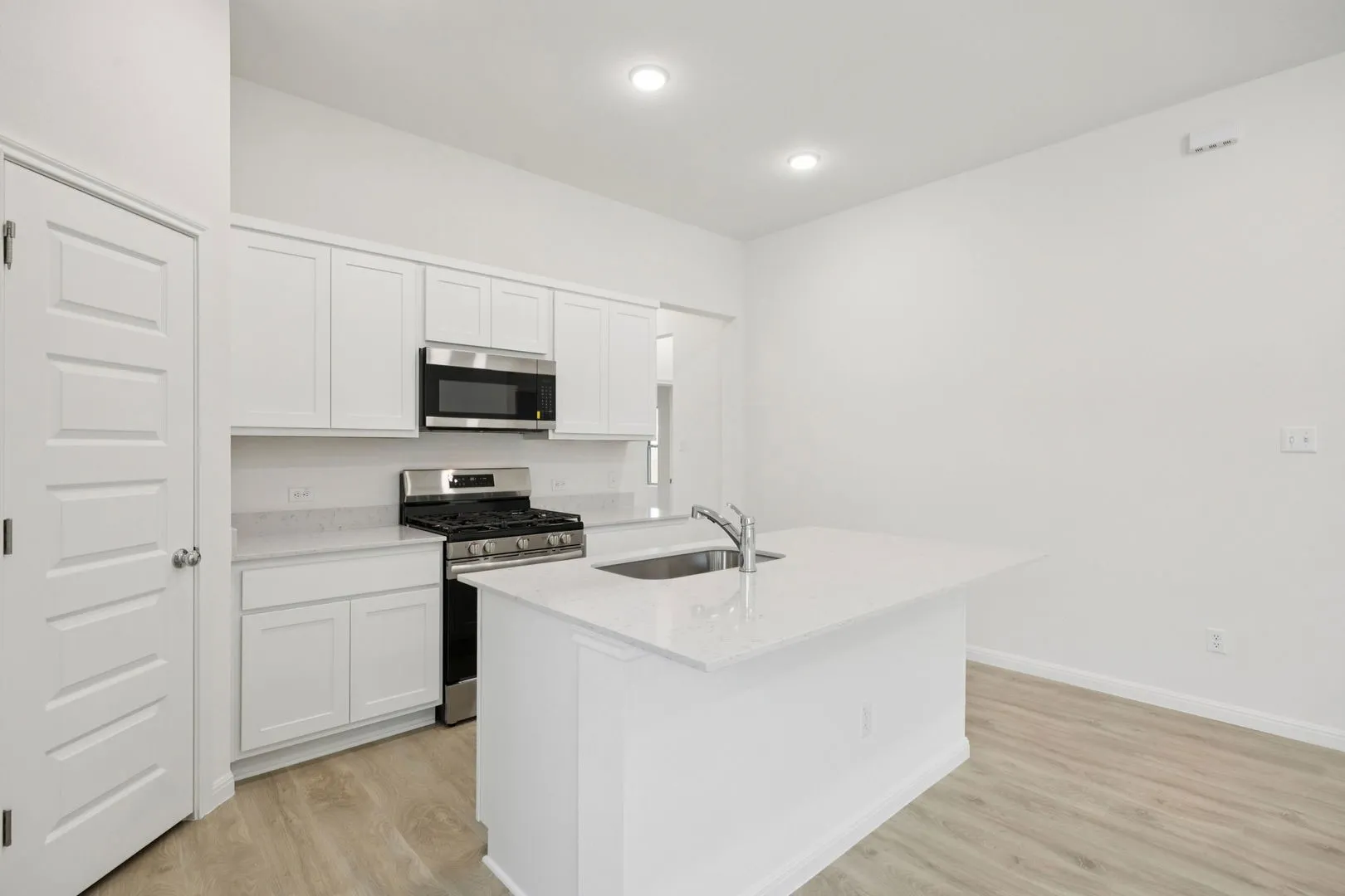 Kitchen in the Cypress home plan by Trophy Signature Homes - REPRESENTATIVE PHOTO