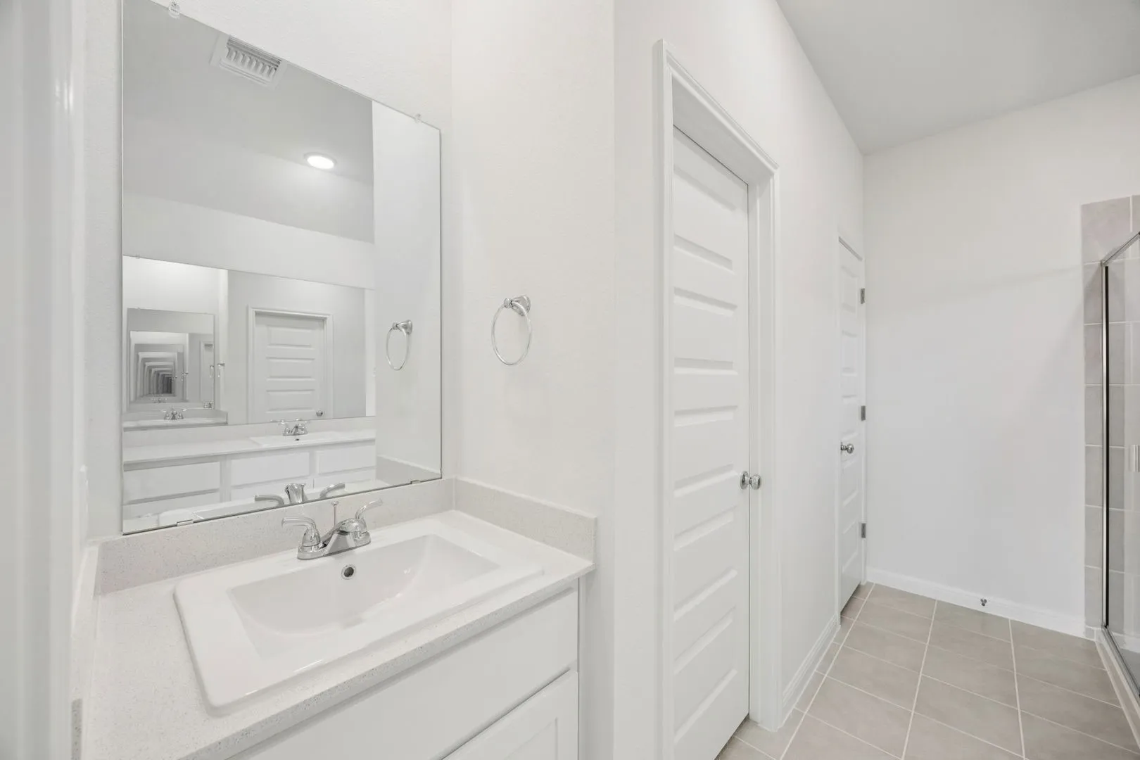 Primary Bathroom in the Cypress home plan by Trophy Signature Homes - REPRESENTATIVE PHOTO
