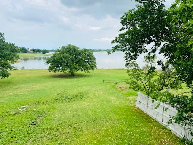 View of yard featuring a water view