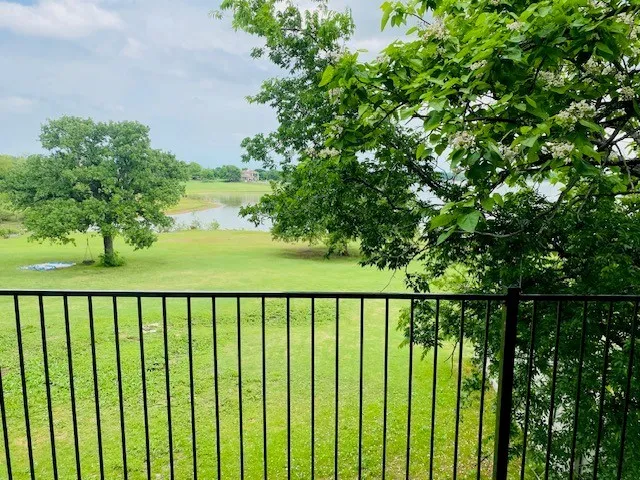 View of grassy yard featuring a water view