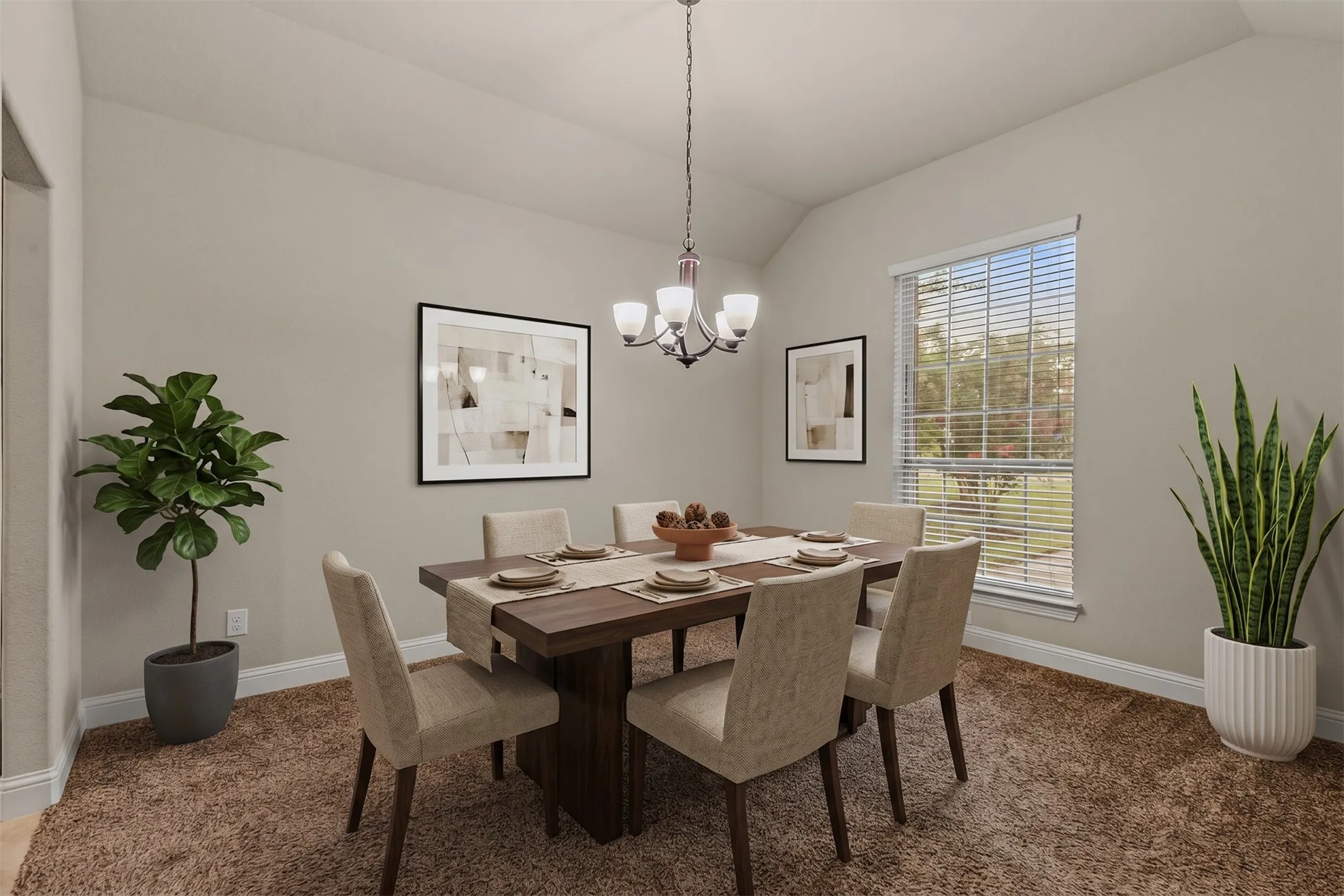 Vaulted ceiling dining area featuring neutral wall tones, a five-light chandelier, and a large window with horizontal blinds