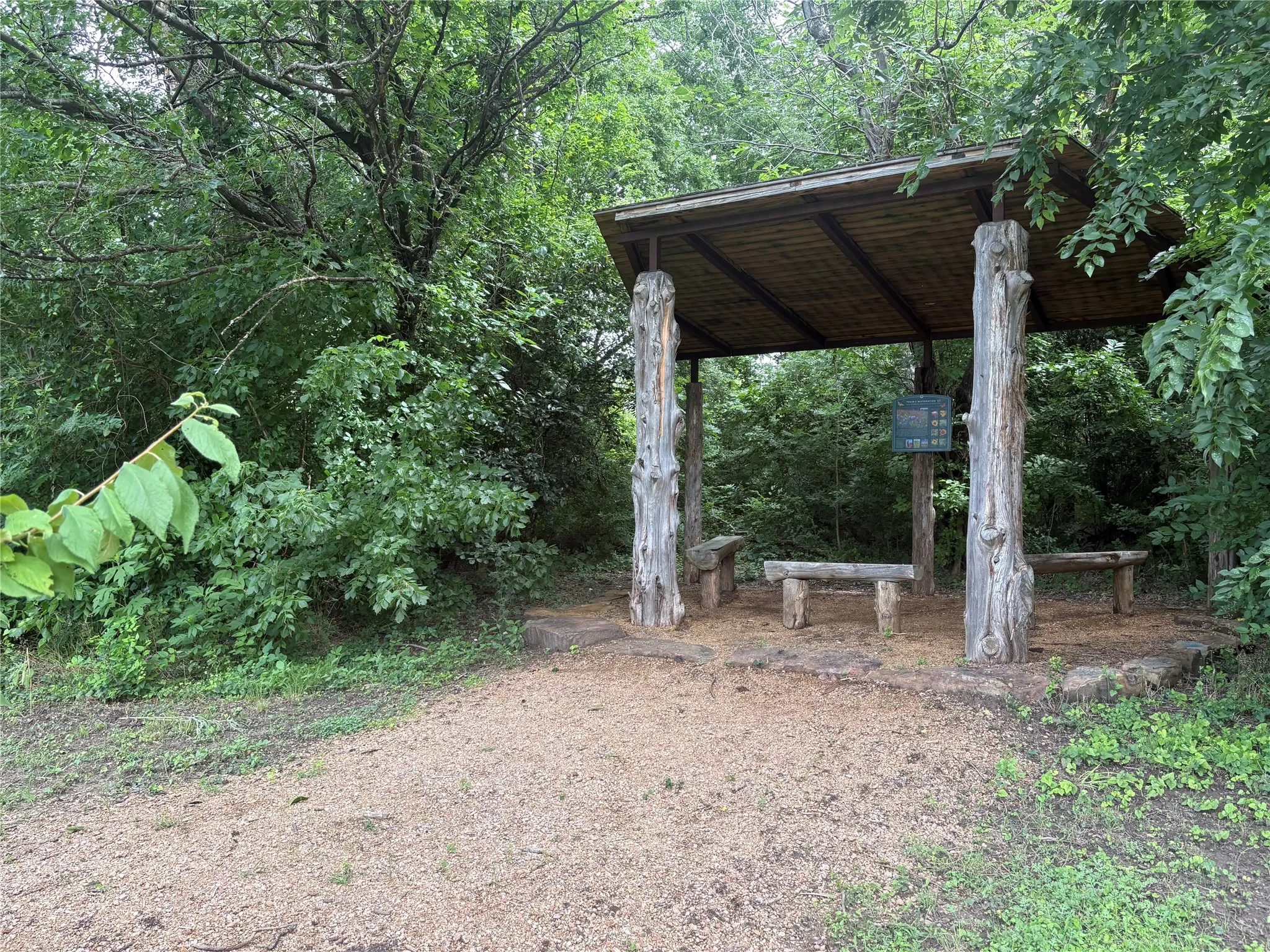Mediation bench at Pettinger Nature Preserve, walking and biking trails.