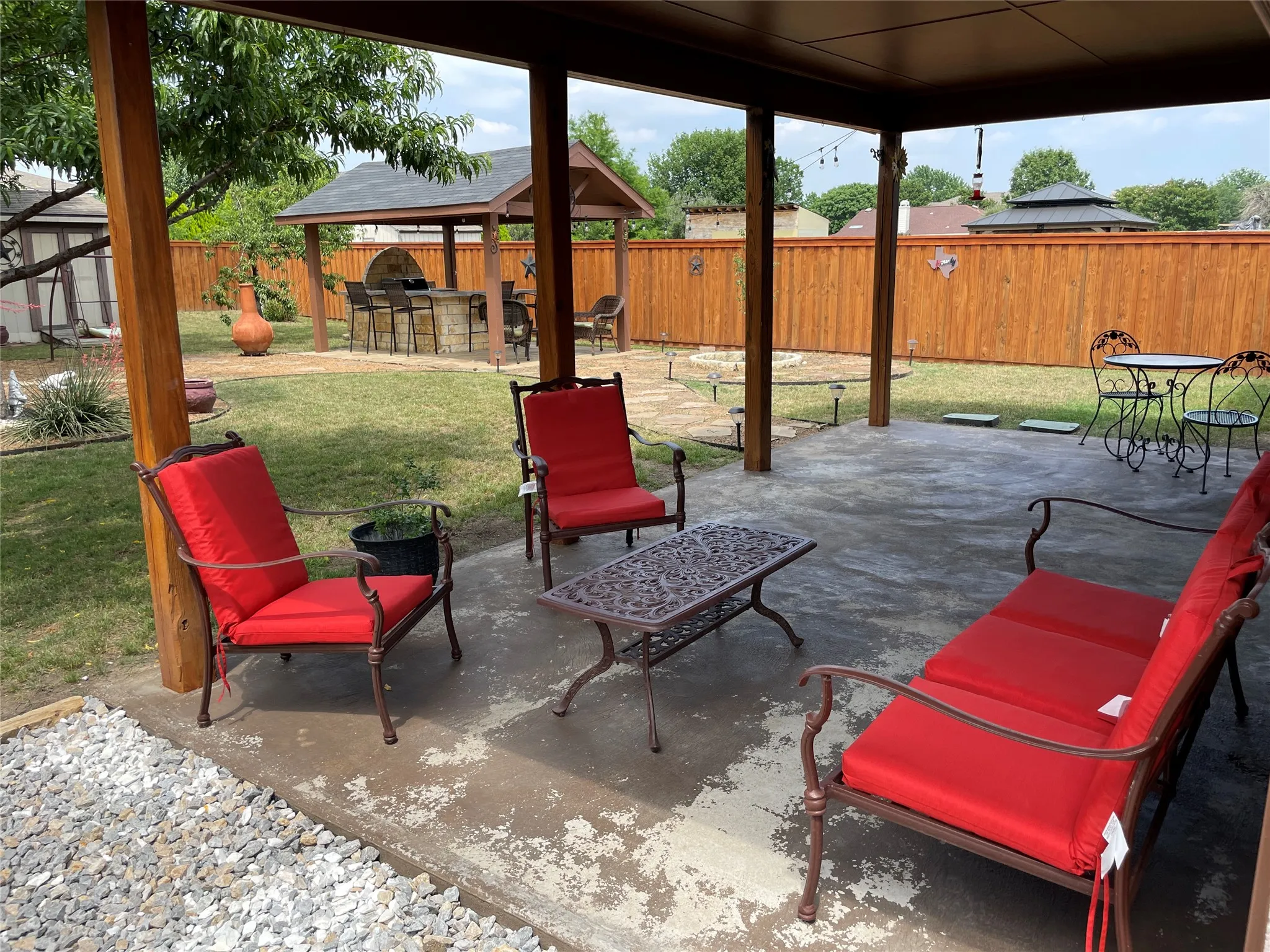 View of patio with a bar