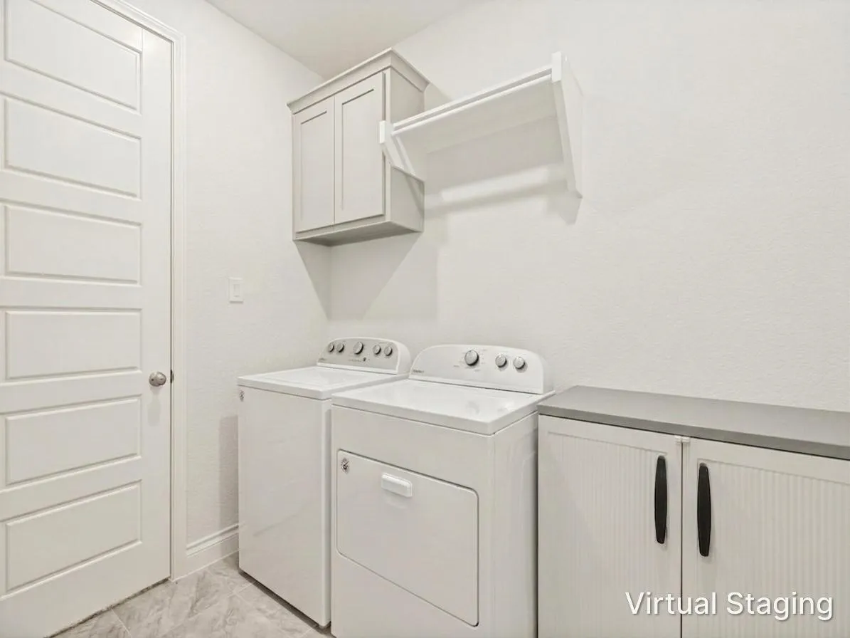Laundry Room that connects to the primary bedroom