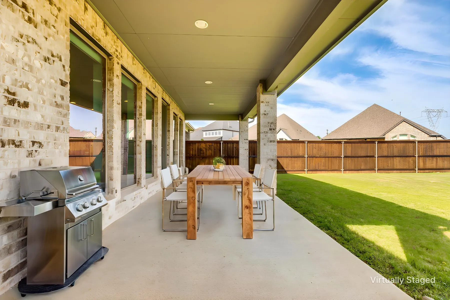 Extended Covered Patio with room for Dining and Outdoor Kitchen