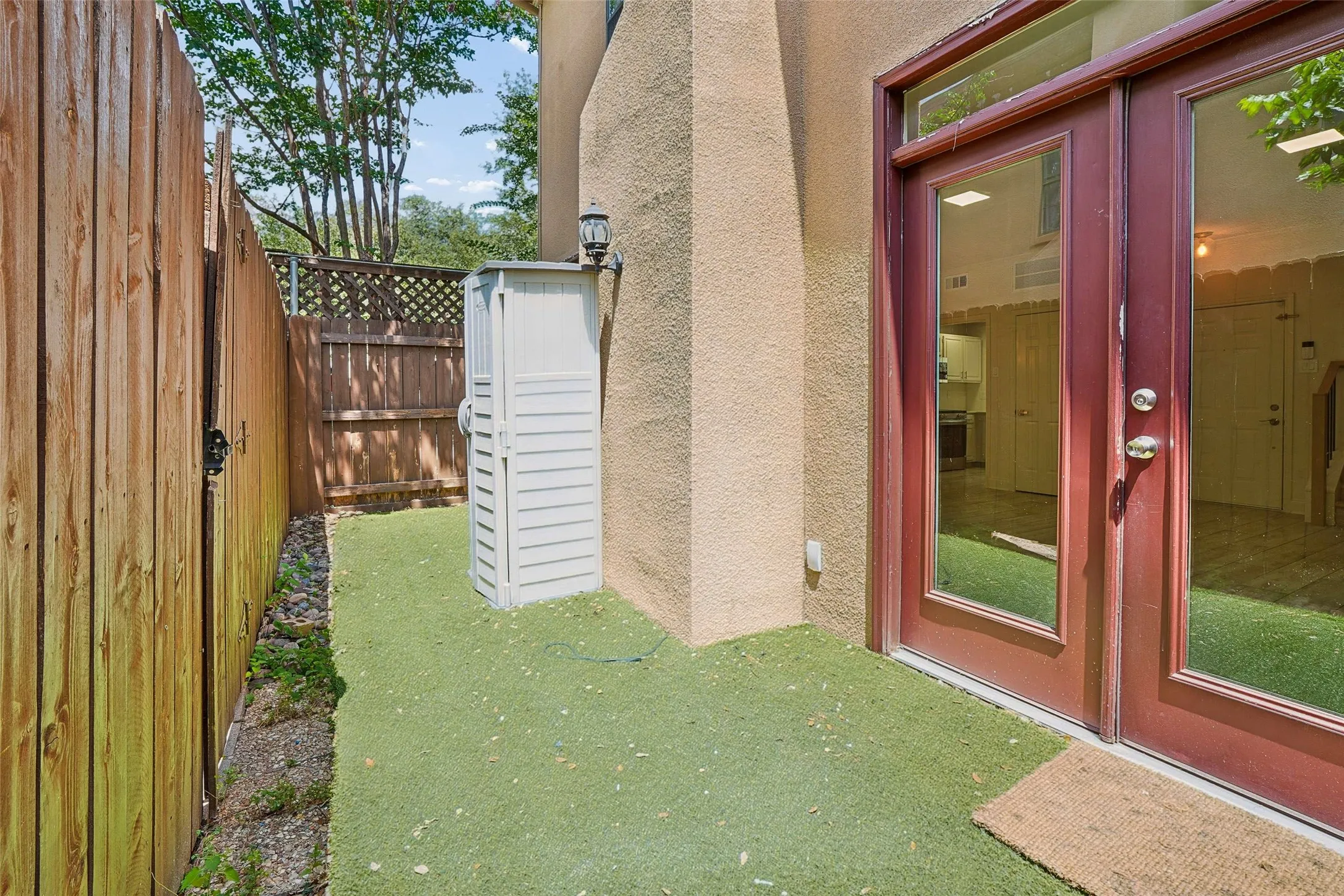 Privately fenced patio.