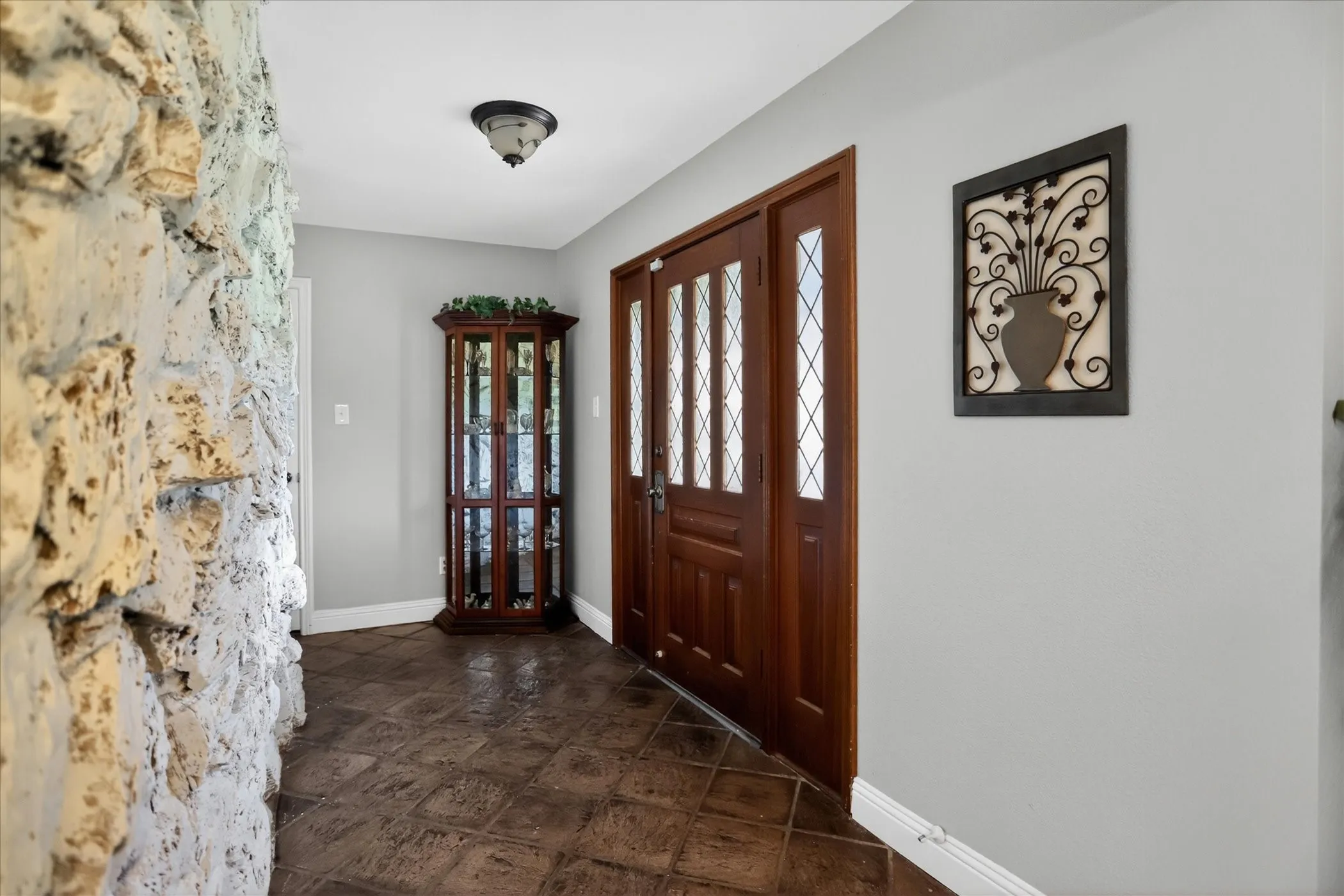 Rockwall greets you at this spacious entrance.