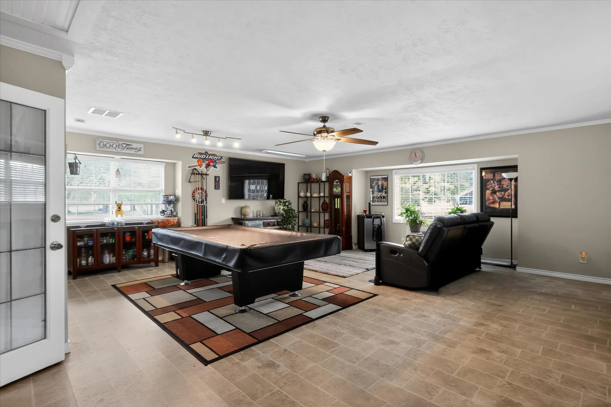 This game room has additional closets.