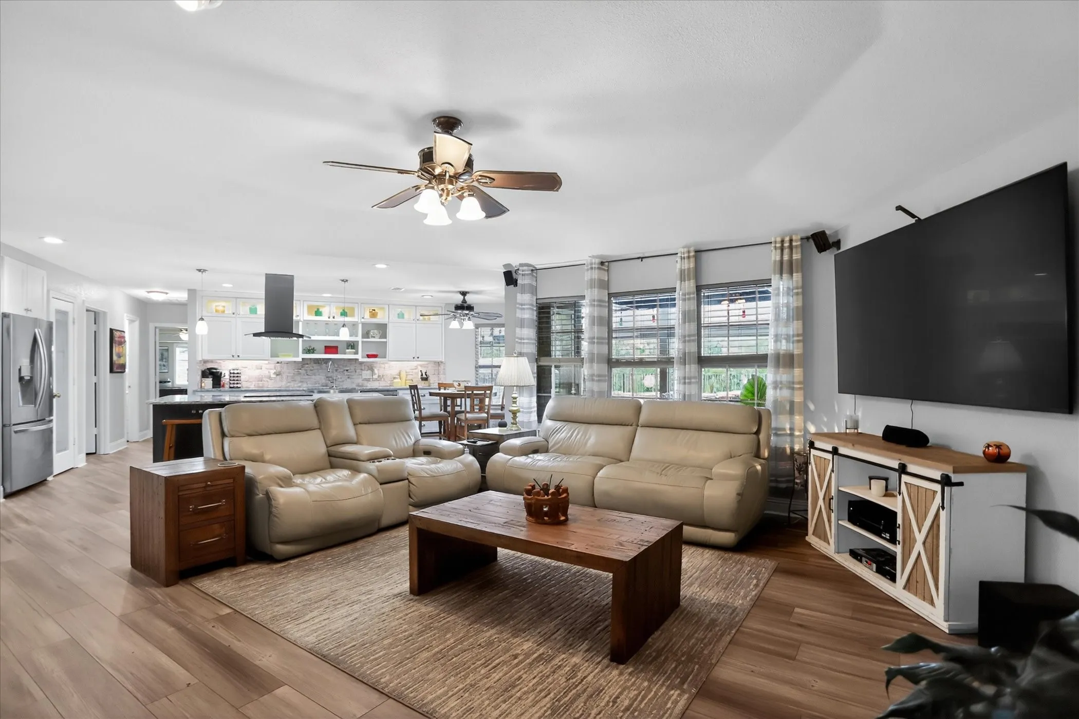 Living room is light and open to kitchen.
