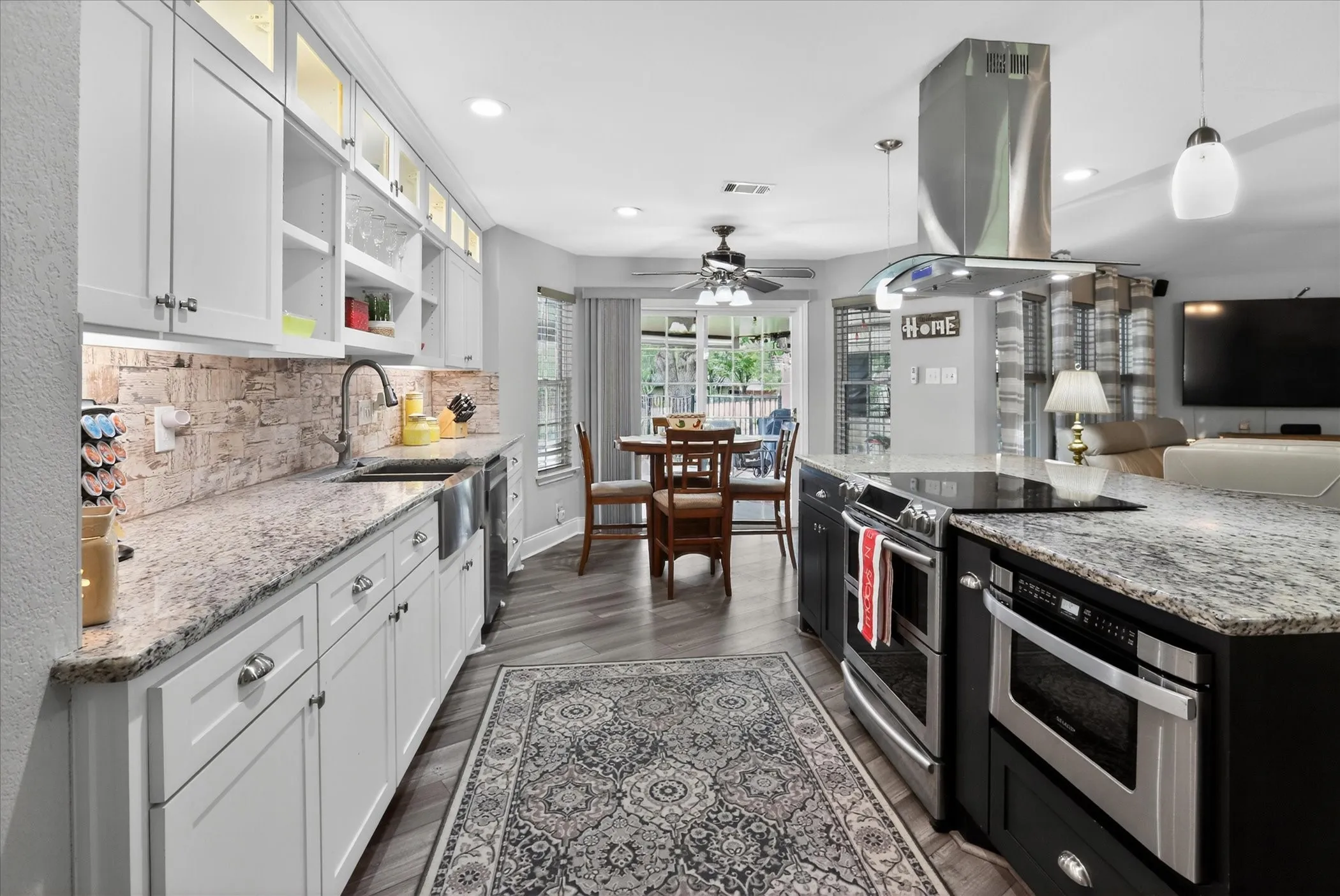 Updated Chef's inspired kitchen with granite, stainless steel appliances & drawer microwave built-in.