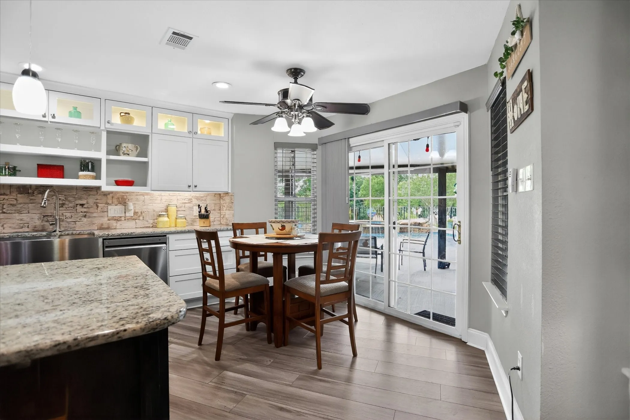 Eat in kitchen area with views of the pool area.