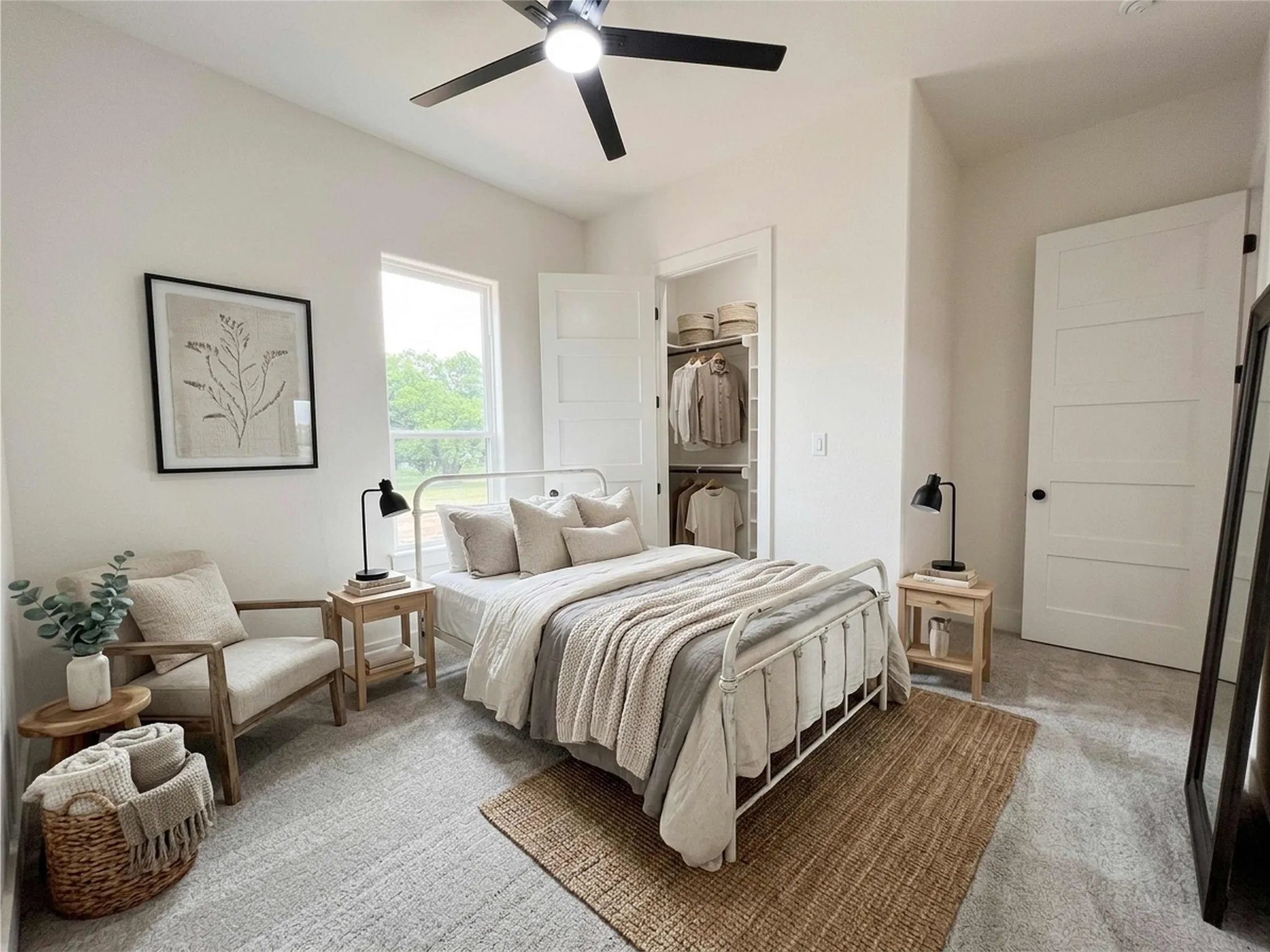 Carpeted bedroom featuring a large window, a ceiling fan with integrated lighting, a built-in closet with shelving and hanging rods, and a solid five-panel interior door