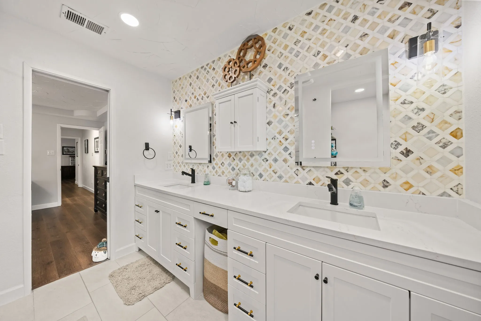 Dual vanity with integrated sinks and white countertops