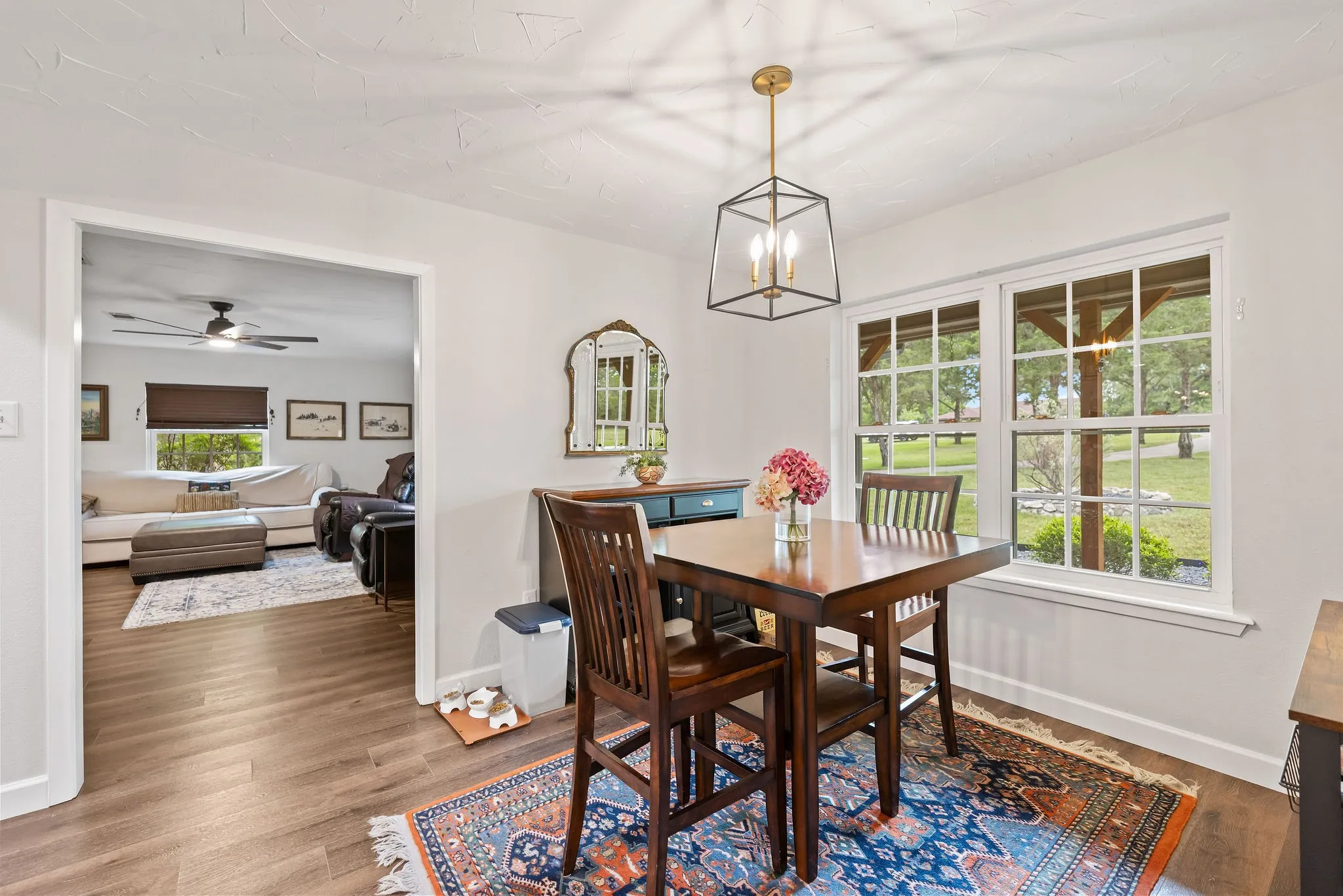 Bright dining area with wood-finish flooring