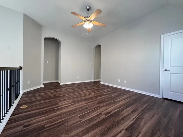 Spacious loft offers an additional living room with new wood-finish flooring, light gray walls, and white baseboards