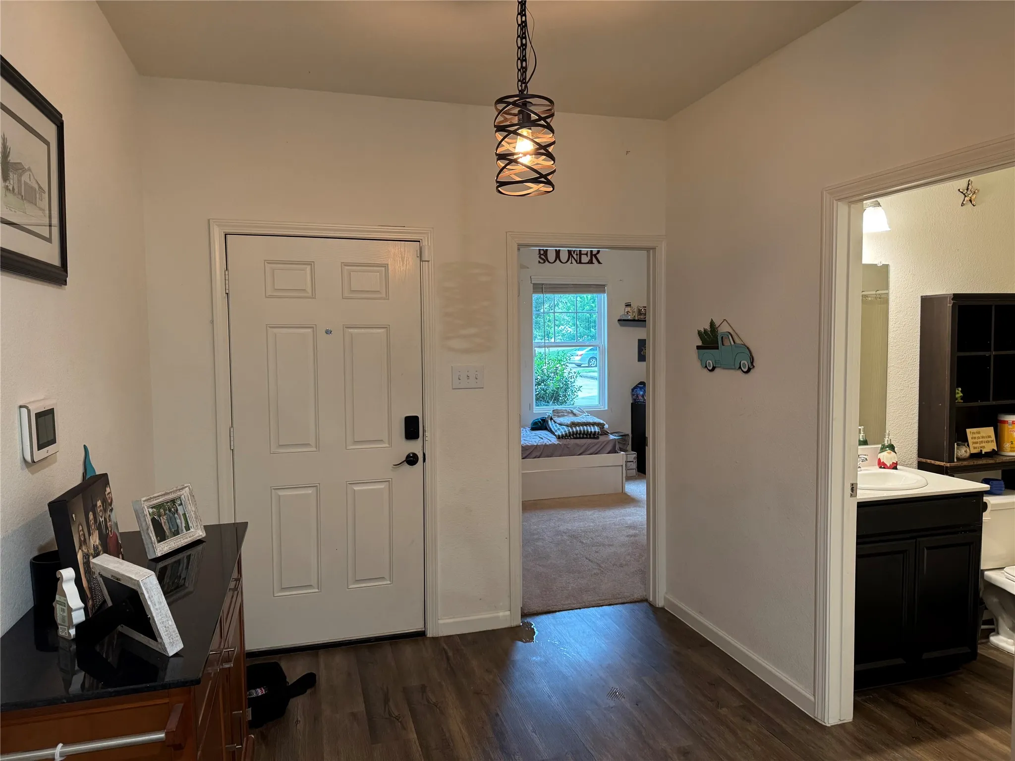 Wood-finish flooring throughout the entryway