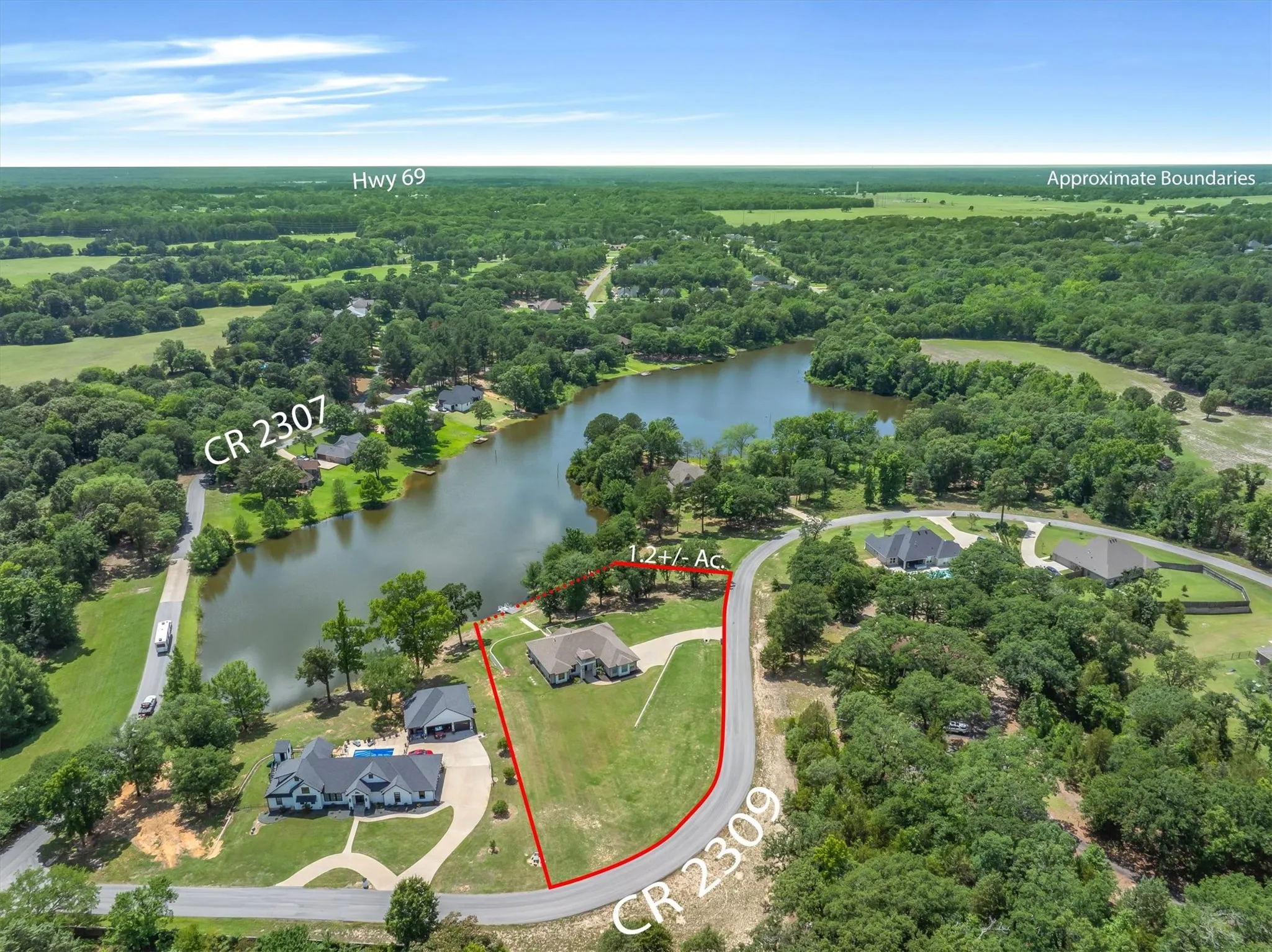 Over 1.2 acres of private lakefront property