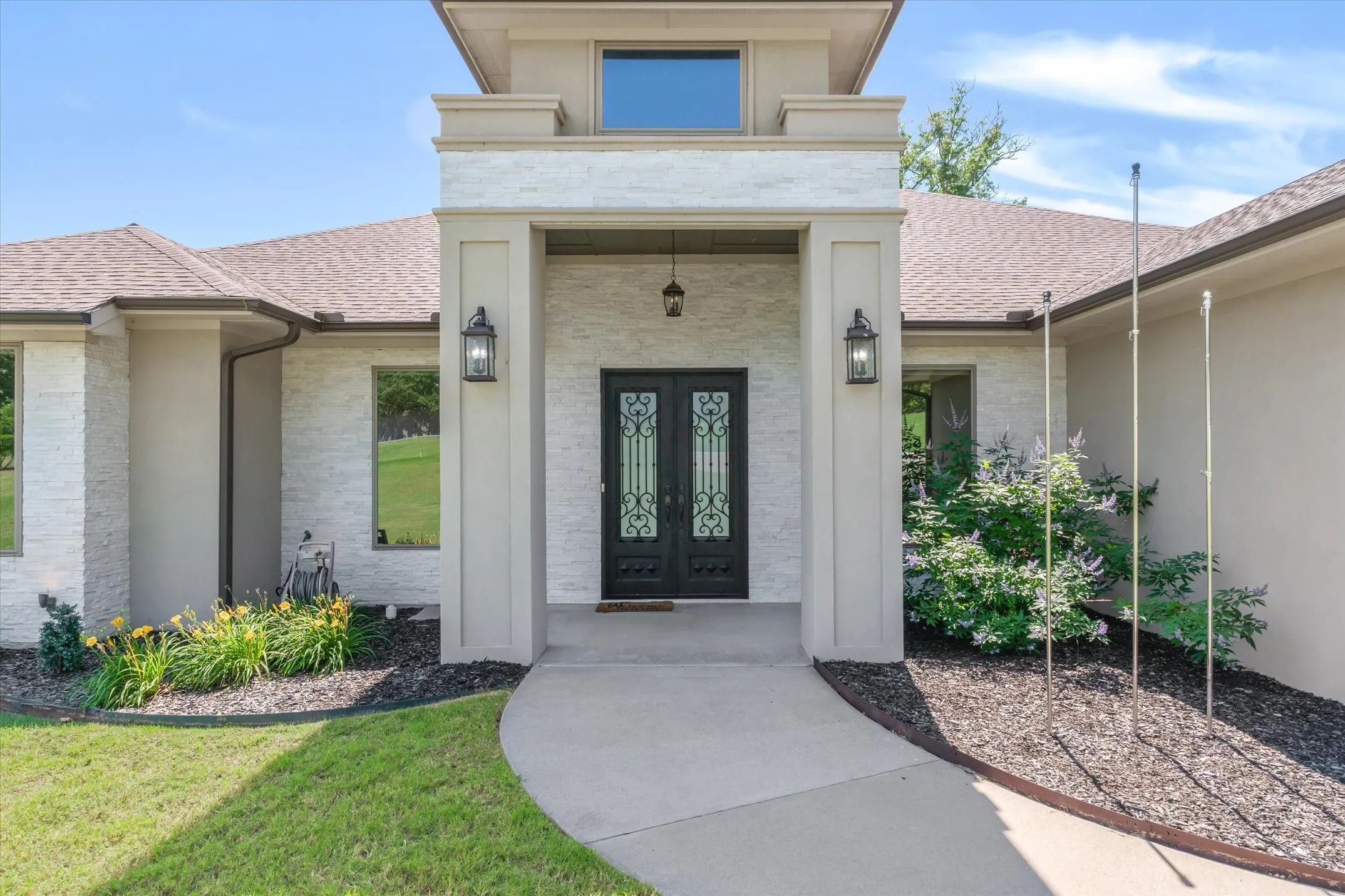 Beautiful doors are just the beginning of this lovely home